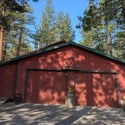 The 2-car oversized garage has heated storage, dedicated wood storage, and a storage room. Plus exterior shed and wood storage.