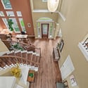Breathtaking foyer with sweeping staircase and abundant natural light creates an inviting entrance to your new home.