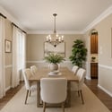 Bright dining area featuring large windows, tasteful decor, and ample space for gatherings and entertaining.