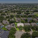 Spacious home nestled in a vibrant community, surrounded by lush greenery and convenient amenities.