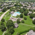 Discover this vibrant neighborhood featuring spacious yards, a community pool, playground, and well-maintained surroundings.