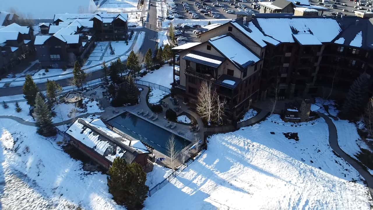 41 of 42. Trailhead lodge with outdoor pools, surrounded by stunning mountain views and convenient access to recreational activities.