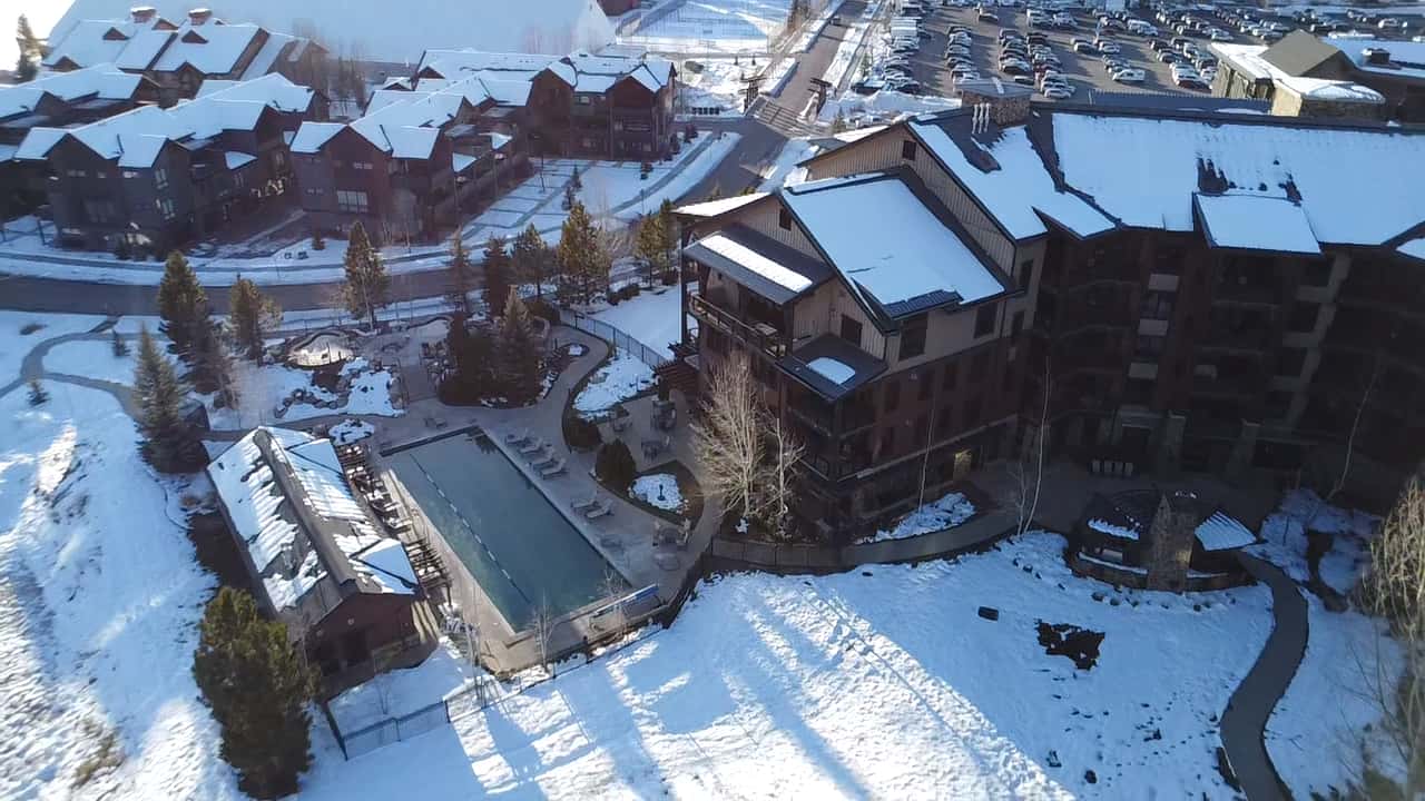 38 of 42. This aerial view showcases the pools at Trailhead Lodge, amenities available to Wildhorse Meadows homeowners and guests. Perfect for winding down after an athletic day in the great outdoors.