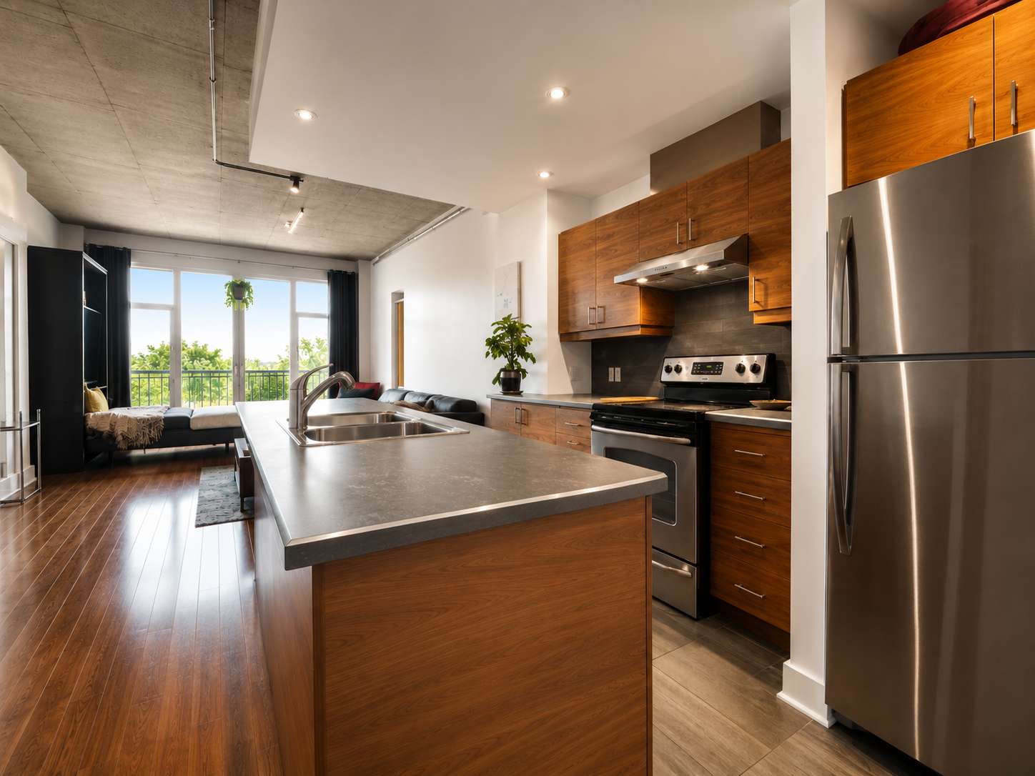 9 of 21. Modern kitchen with sleek cabinetry, stainless steel appliances, and an open layout inviting natural light.