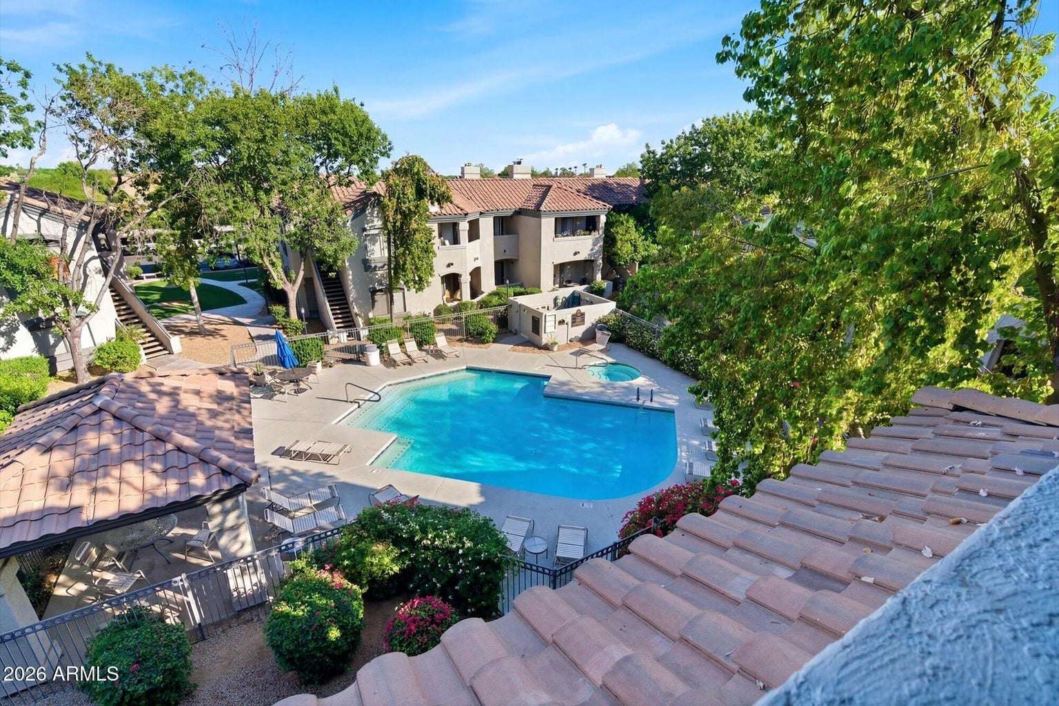1 of 32. Enjoy resort-style living with a sparkling heated pool, relaxing spa, beautifully landscaped grounds, and inviting lounge areas. Scottsdale Signature offers exceptional amenities designed for relaxation and year-round enjoyment.