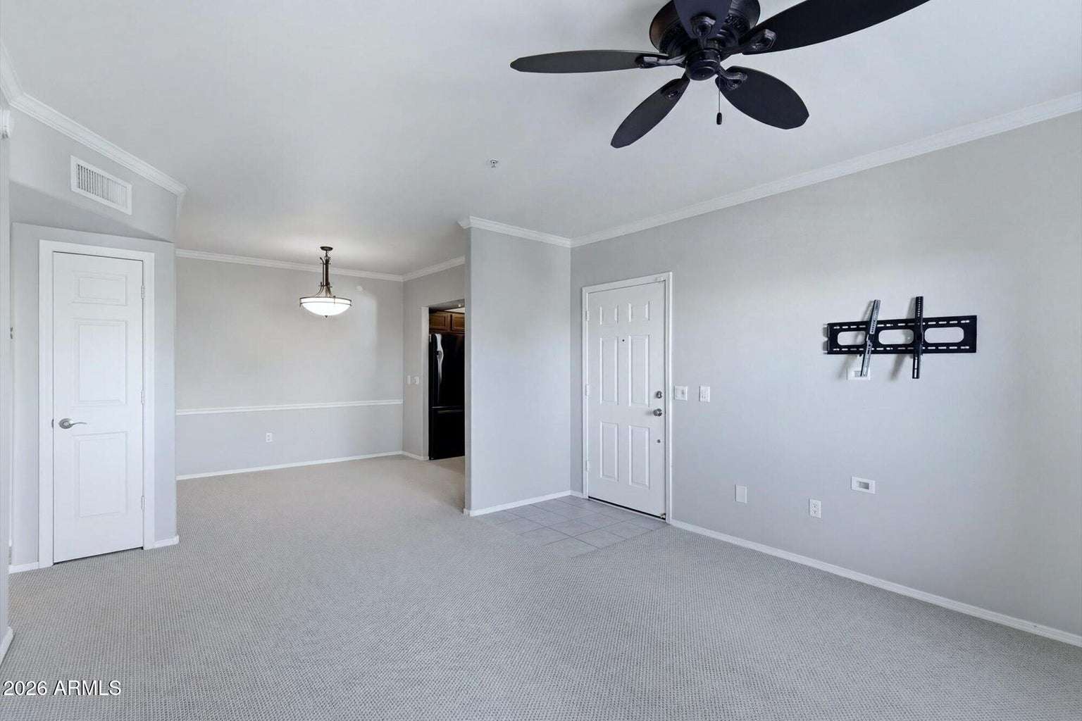 6 of 32. The spacious great room offers endless possibilities for furniture placement while connecting naturally with the dining area and kitchen, creating an ideal layout for modern living.
