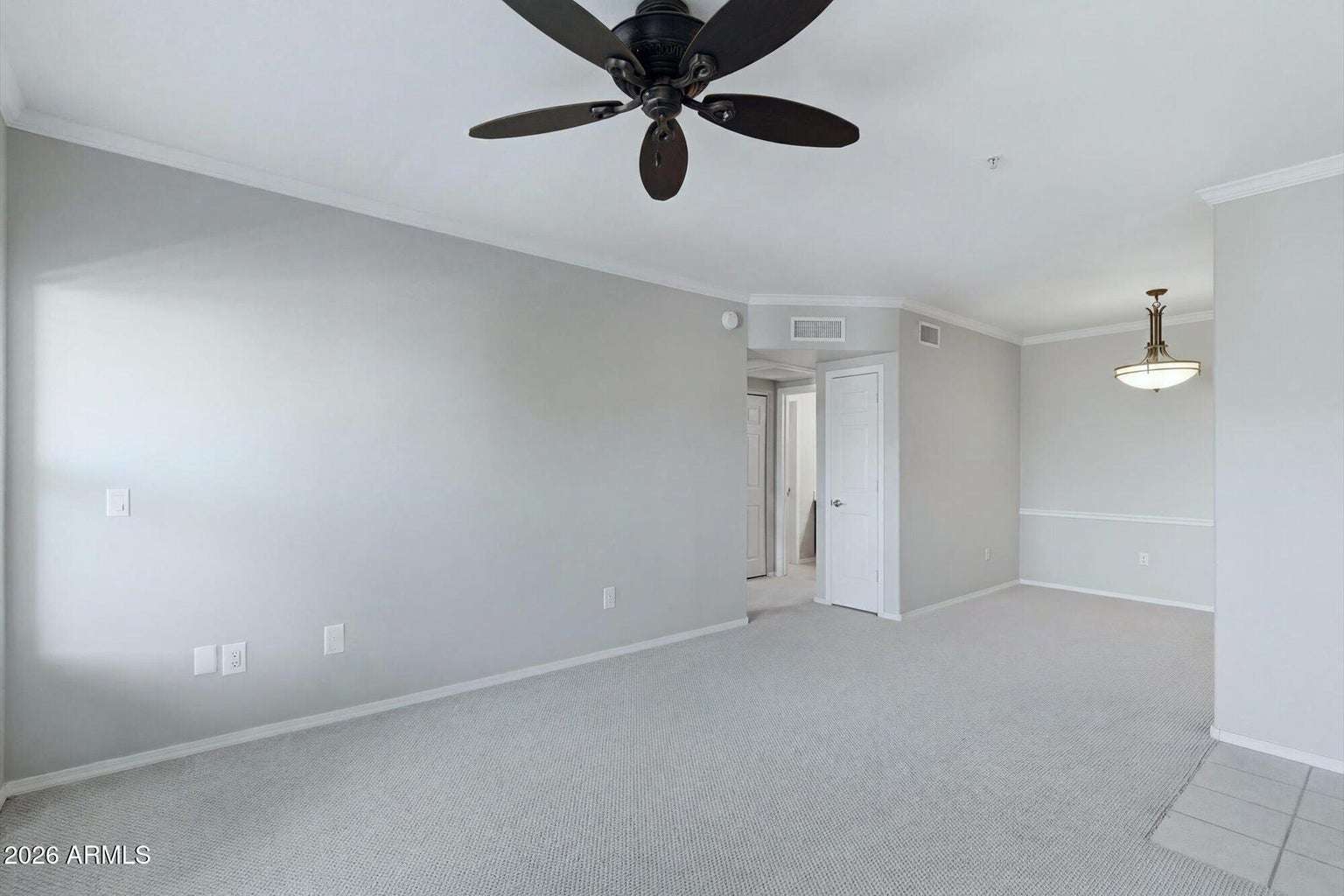 7 of 32. A second perspective highlights the generous dimensions of the great room and its easy flow throughout the home. Neutral finishes provide a move-in-ready canvas for any decorating style.