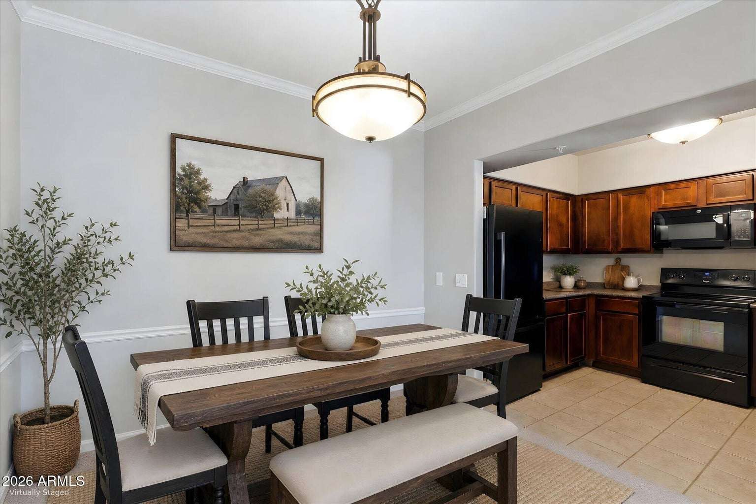 8 of 32. Virtually staged to inspire, the dining space comfortably accommodates family dinners while connecting seamlessly to the kitchen with rich cabinetry, ample storage, and updated appliances.