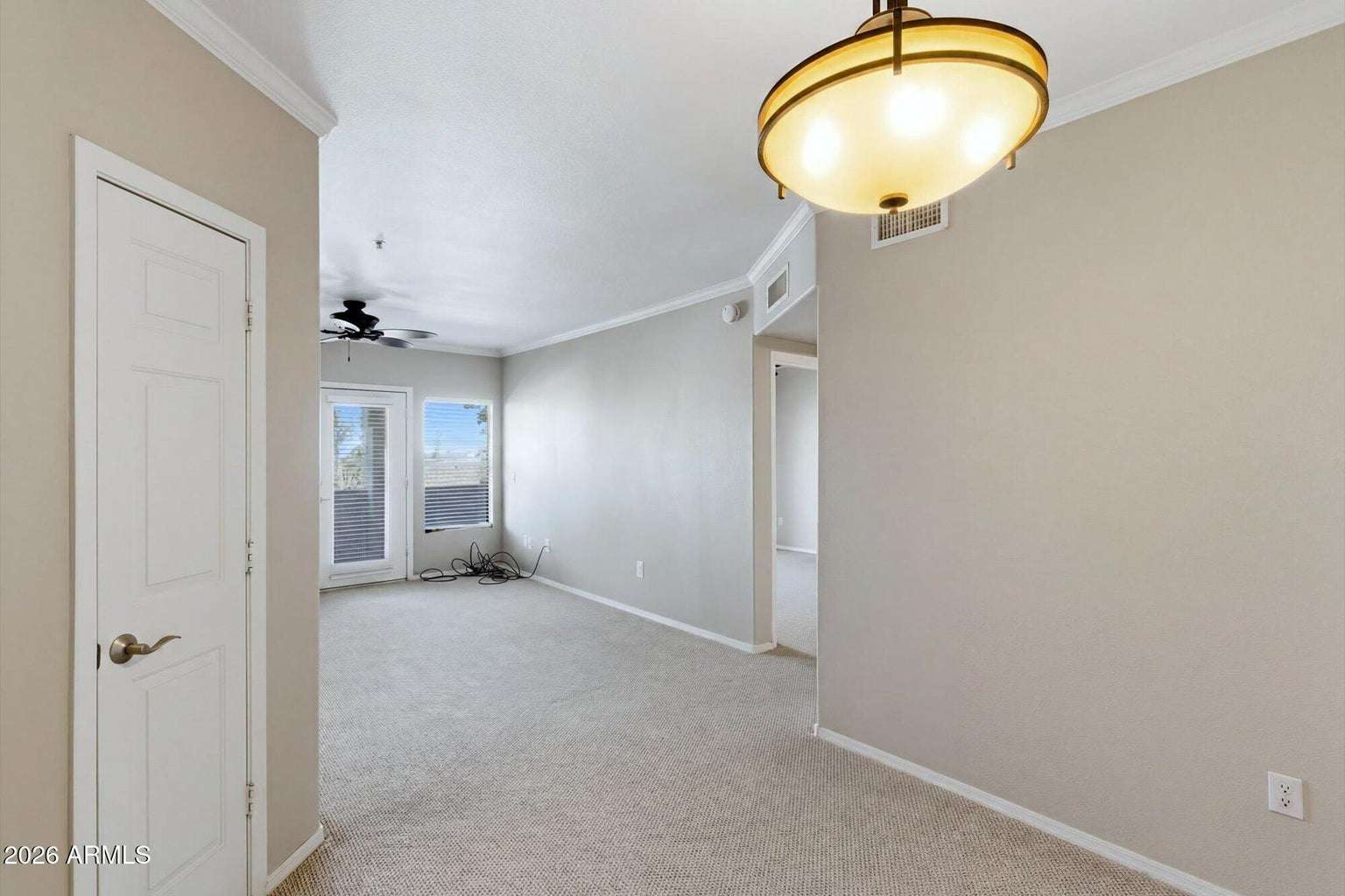 10 of 32. Step inside to an open-concept floor plan featuring spacious living areas, neutral finishes, and abundant natural light. This inviting layout offers both comfort and flexibility in a desirable Scottsdale location.