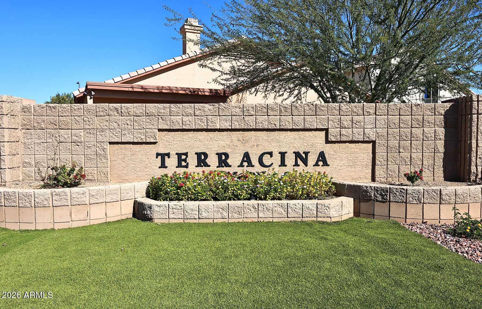 29 of 29. Community monument sign surrounded by landscaped greenery and maintained common areas. A welcoming neighborhood entrance that highlights the pride of ownership found throughout the community.