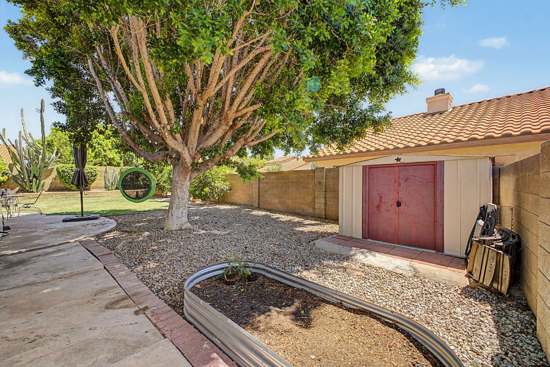 47 of 47. Featuring a detached storage shed, mature shade tree, decorative rock landscaping, and additional outdoor space, this backyard combines beauty and functionality for everyday living at this Glendale rental property.