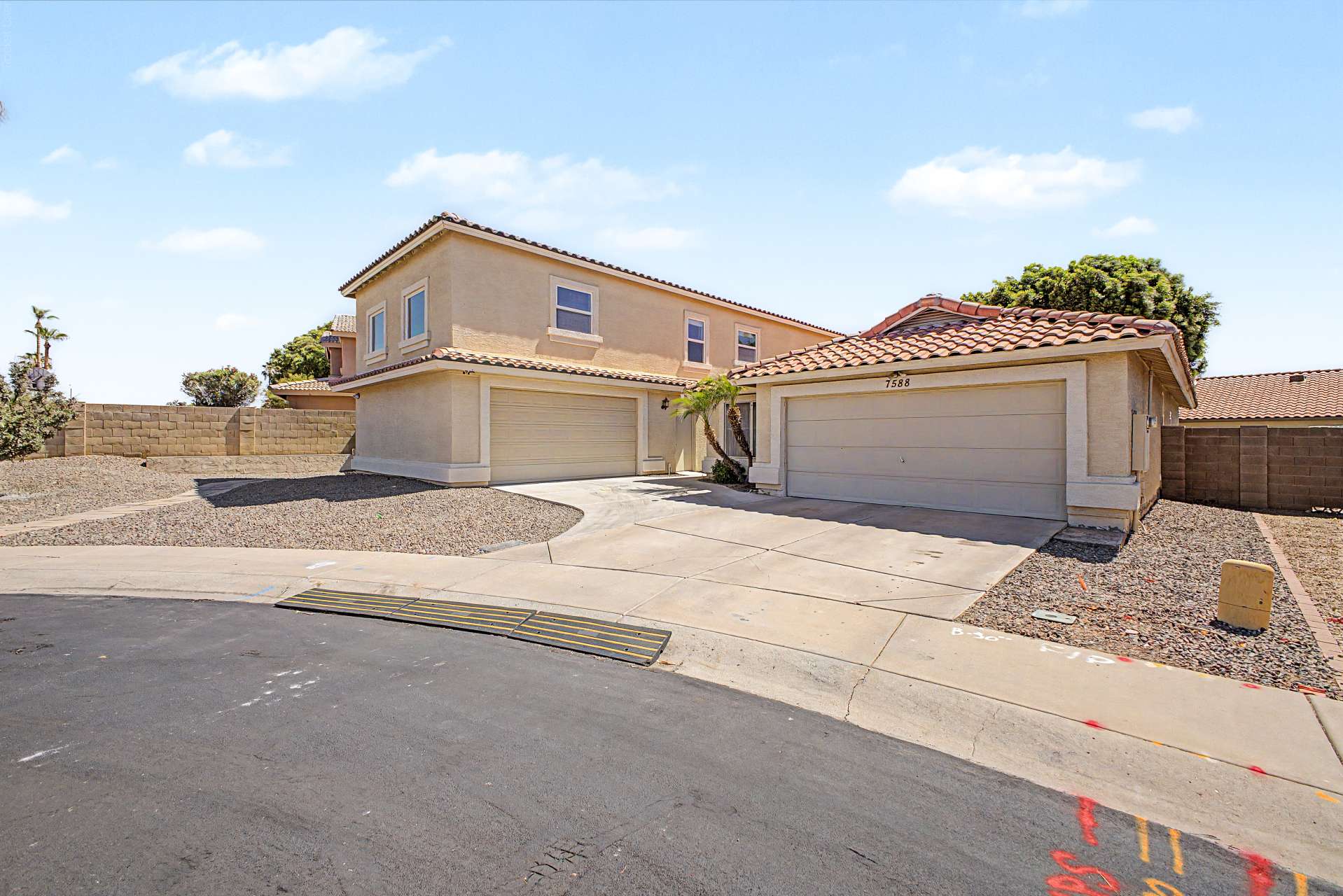 1 of 47. This attractive home offers timeless curb appeal with a spacious driveway, dual attached garages, mature desert landscaping, and a desirable cul-de-sac location within the Arrowhead Ranch community.