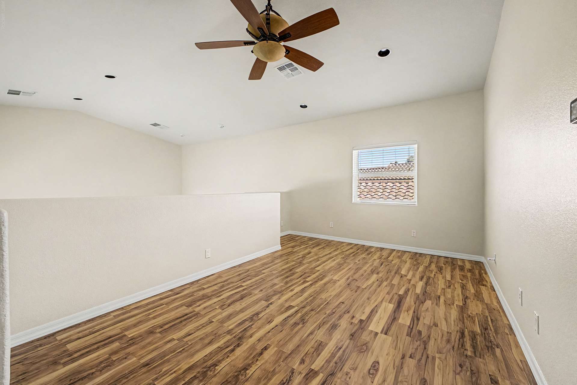 11 of 47. An expansive upstairs loft with updated flooring and ceiling fan offers the flexibility to create a home office, media room, fitness area, or playroom to fit your lifestyle.
