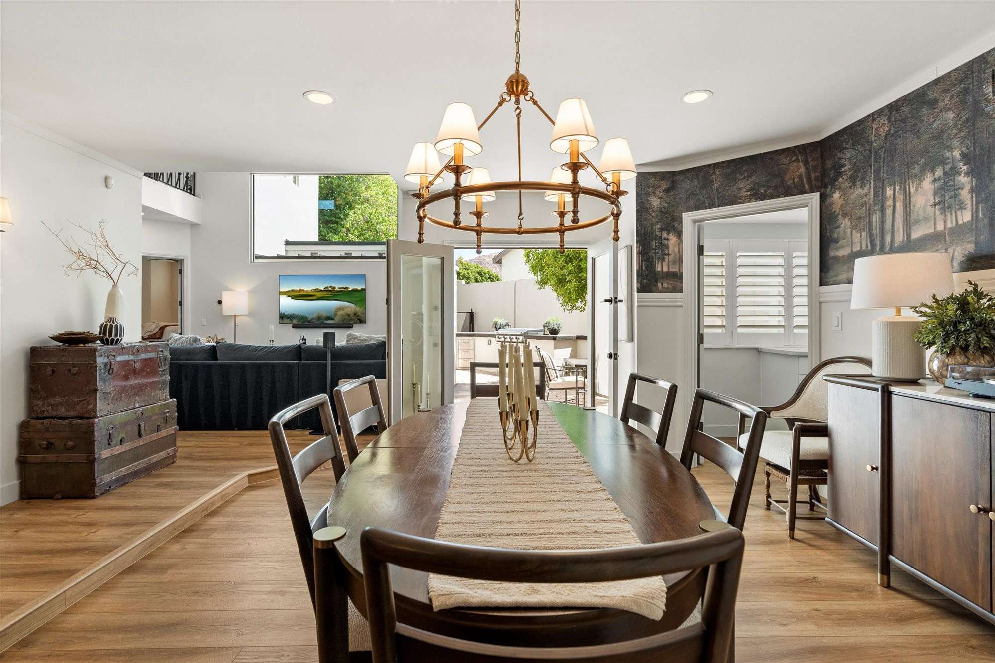 10 of 48. Generous dining area designed for hosting, offering open flow to living spaces and direct access to outdoor entertaining areas.