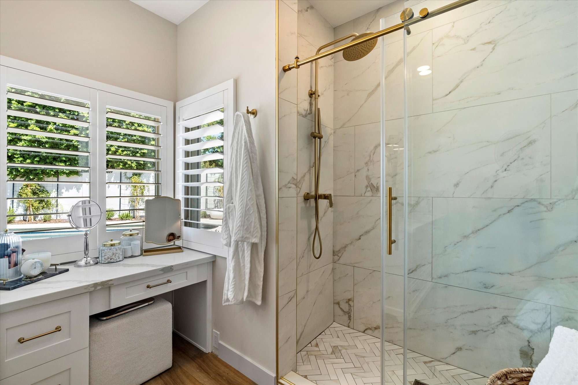 21 of 48. Spa-style walk-in shower with floor-to-ceiling tile, refined hardware, and glass enclosure creating a luxurious daily escape.