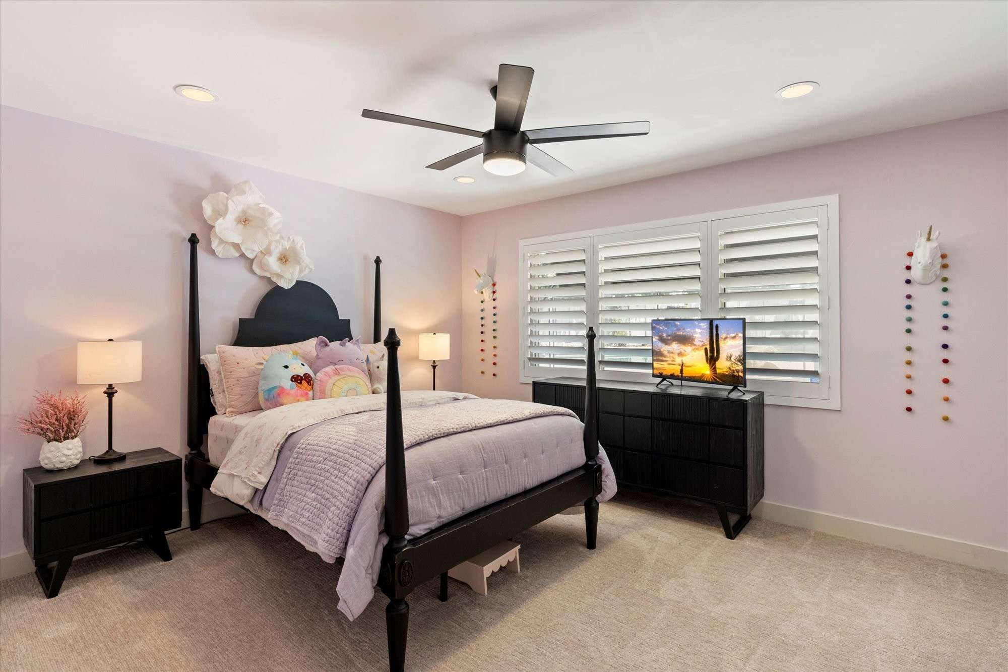 28 of 48. Spacious guest bedroom featuring neutral finishes, ceiling fan, and flexible layout ideal for guests, office, or hobbies.