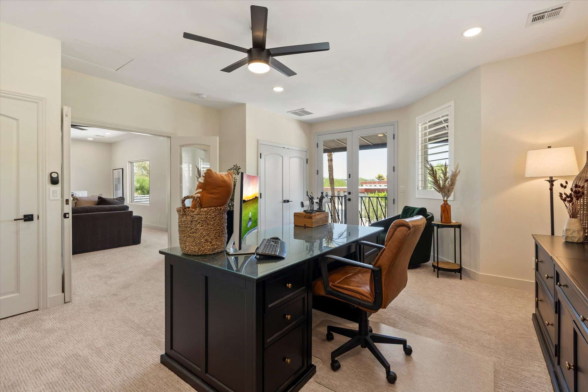 35 of 48. Bonus room offering flexible living options, neutral design, and ample space ideal for work-from-home or guest accommodations.