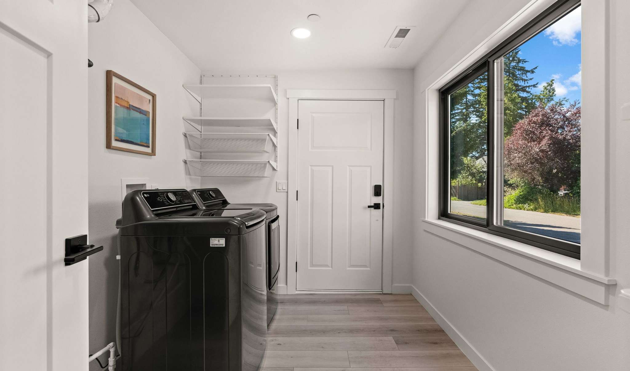 11 of 33. laundry and storage room