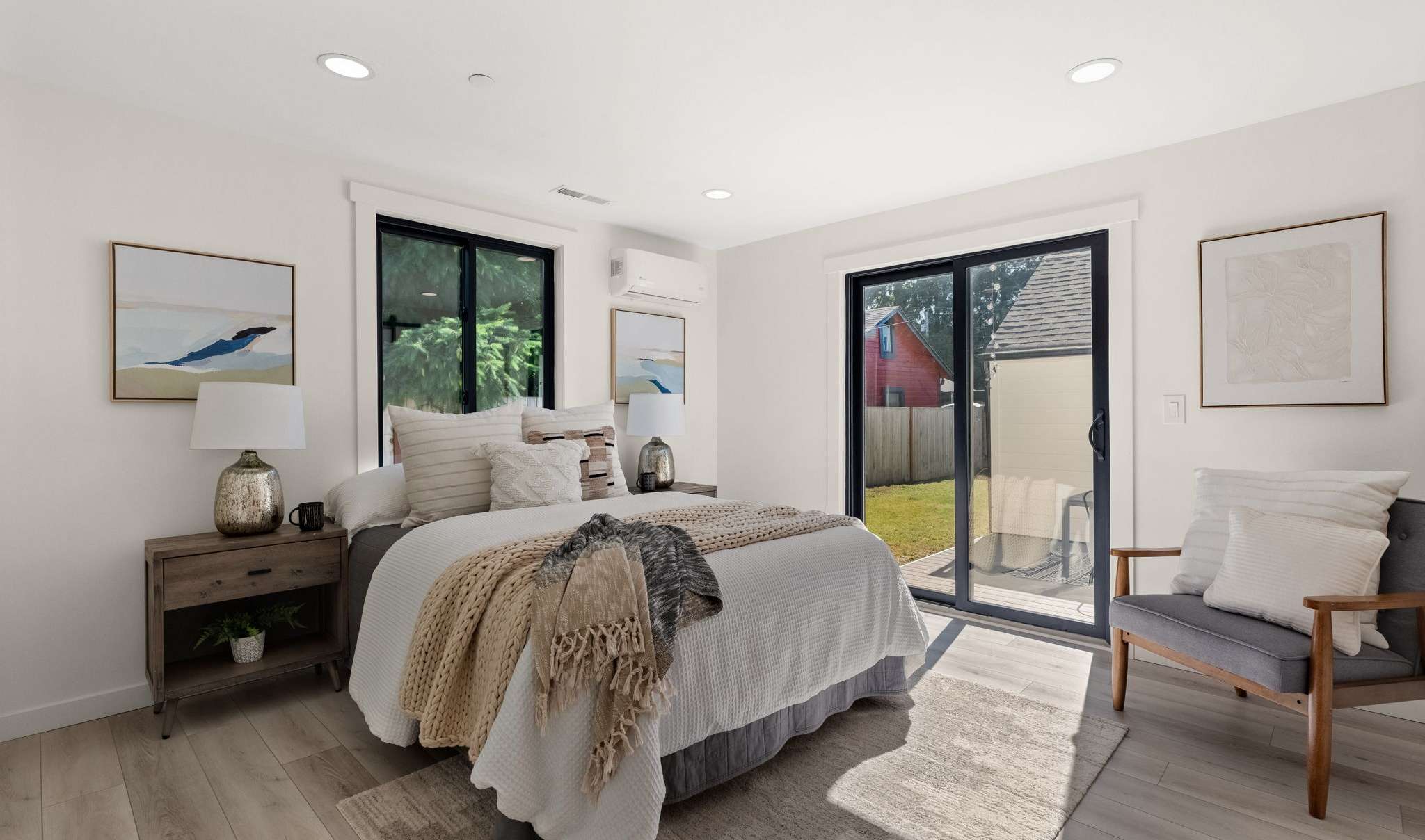 13 of 33. Main level primary bedroom w/ 3/4 bath en suite