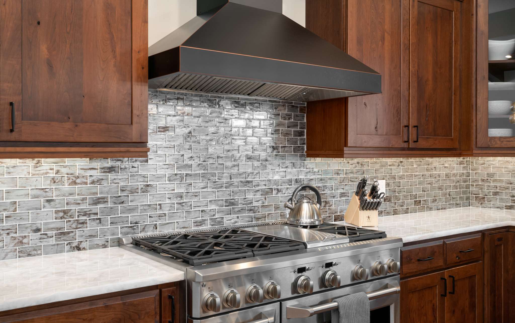 11 of 42. Fully equipped modern kitchen with all the necessary appliances for the gourmet chef. Featuring GE Monogram appliances with 48" gas range.