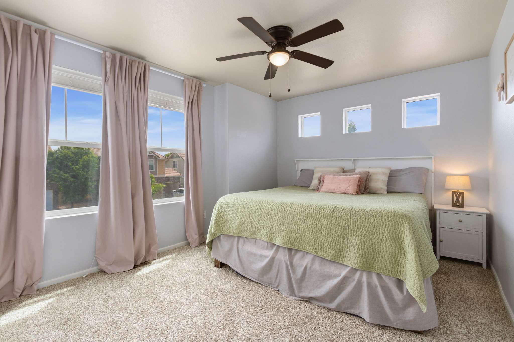 23 of 34. Bedroom 2 on the upper level (king bed pictured)