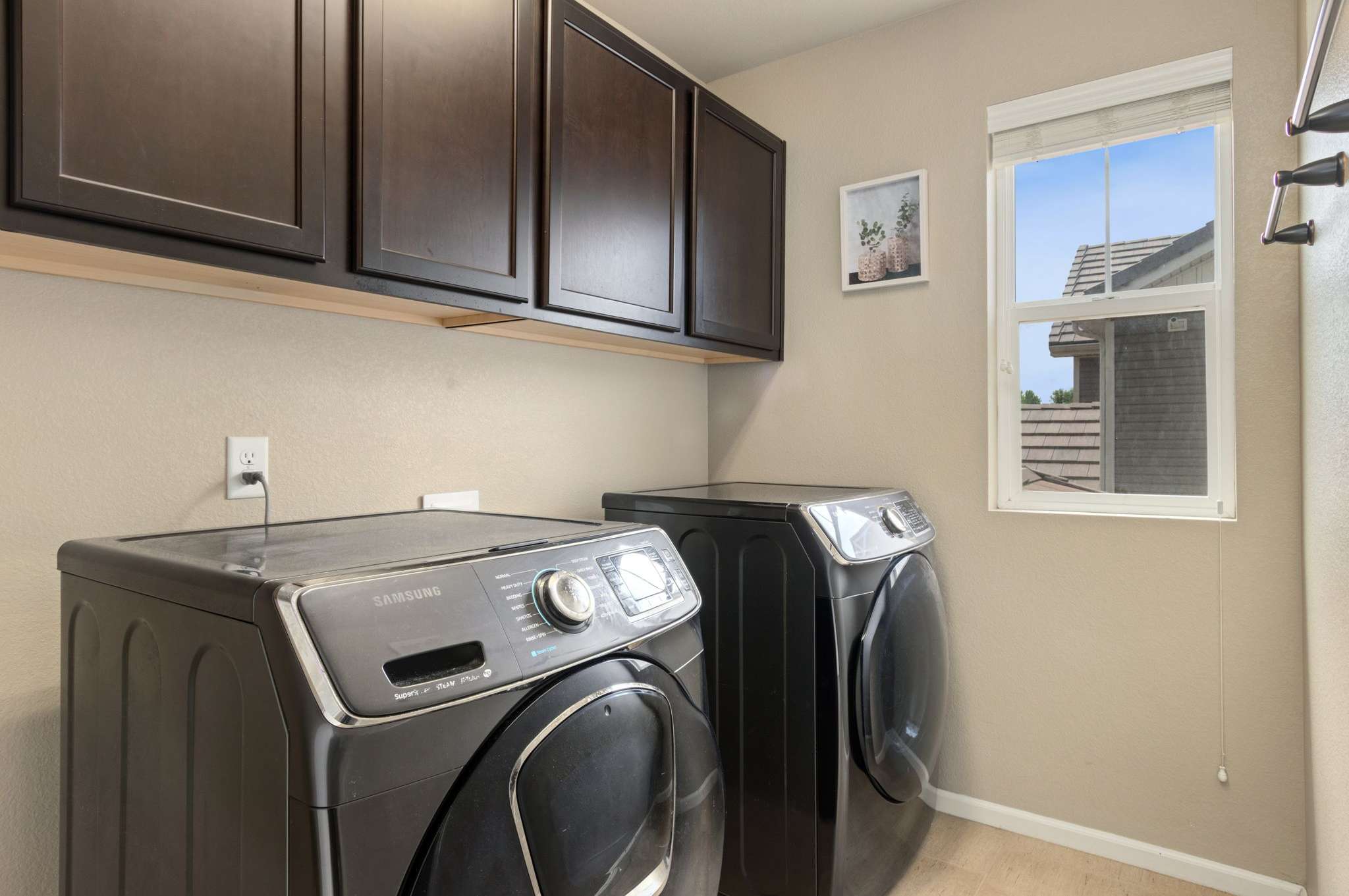 26 of 34. Laundry room is conveniently located upstairs near all of the bedrooms (washer & dryer included)