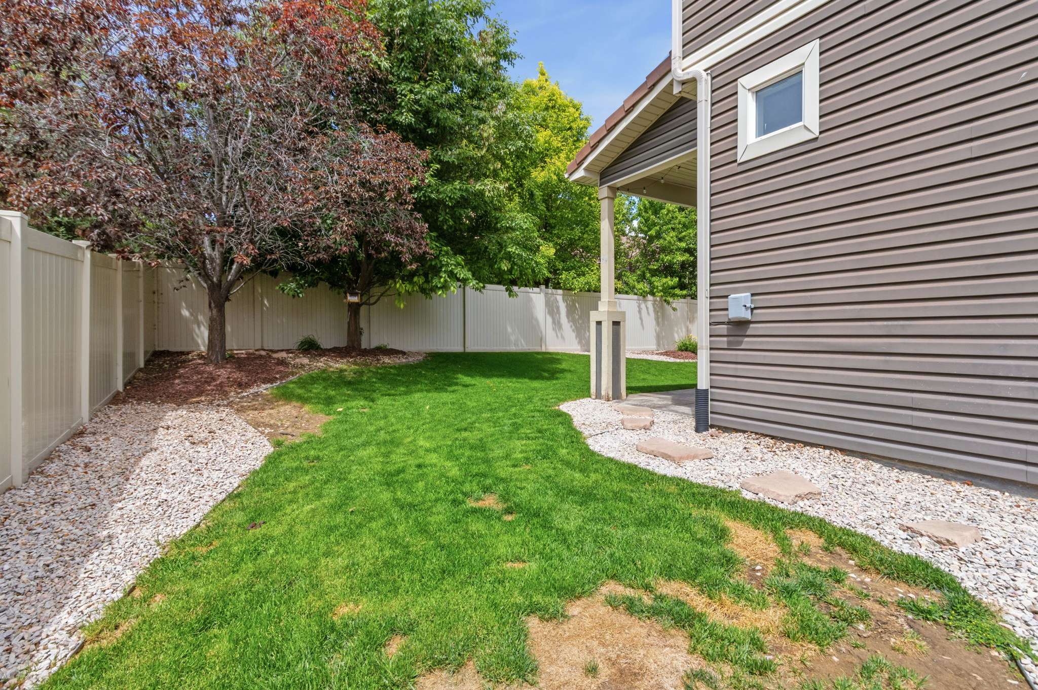 31 of 34. A side yard offers additional space for recreation.