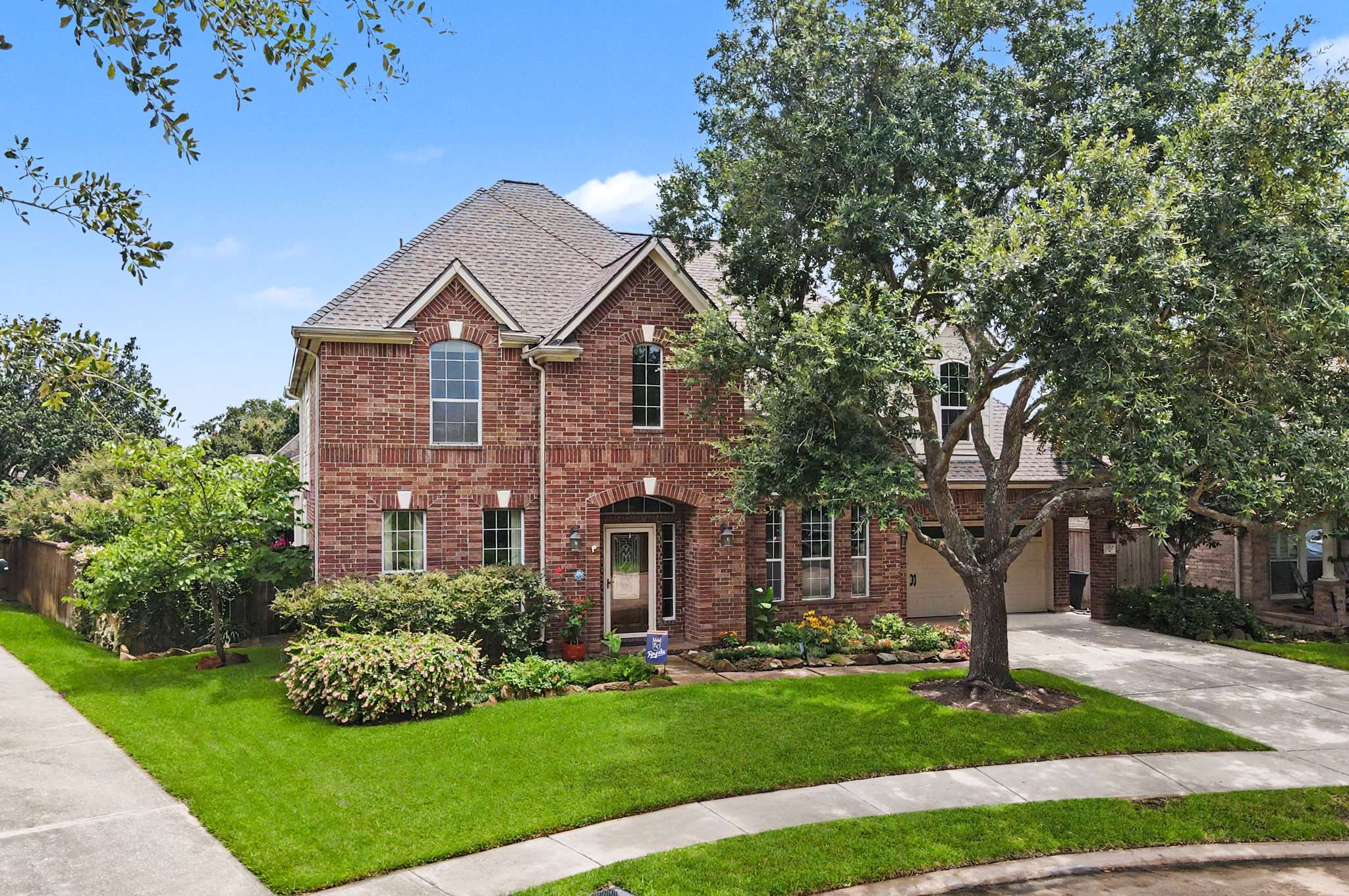 2 of 71. Beautifully landscaped home featuring a spacious layout, perfect for comfortable family living in a desirable neighborhood.