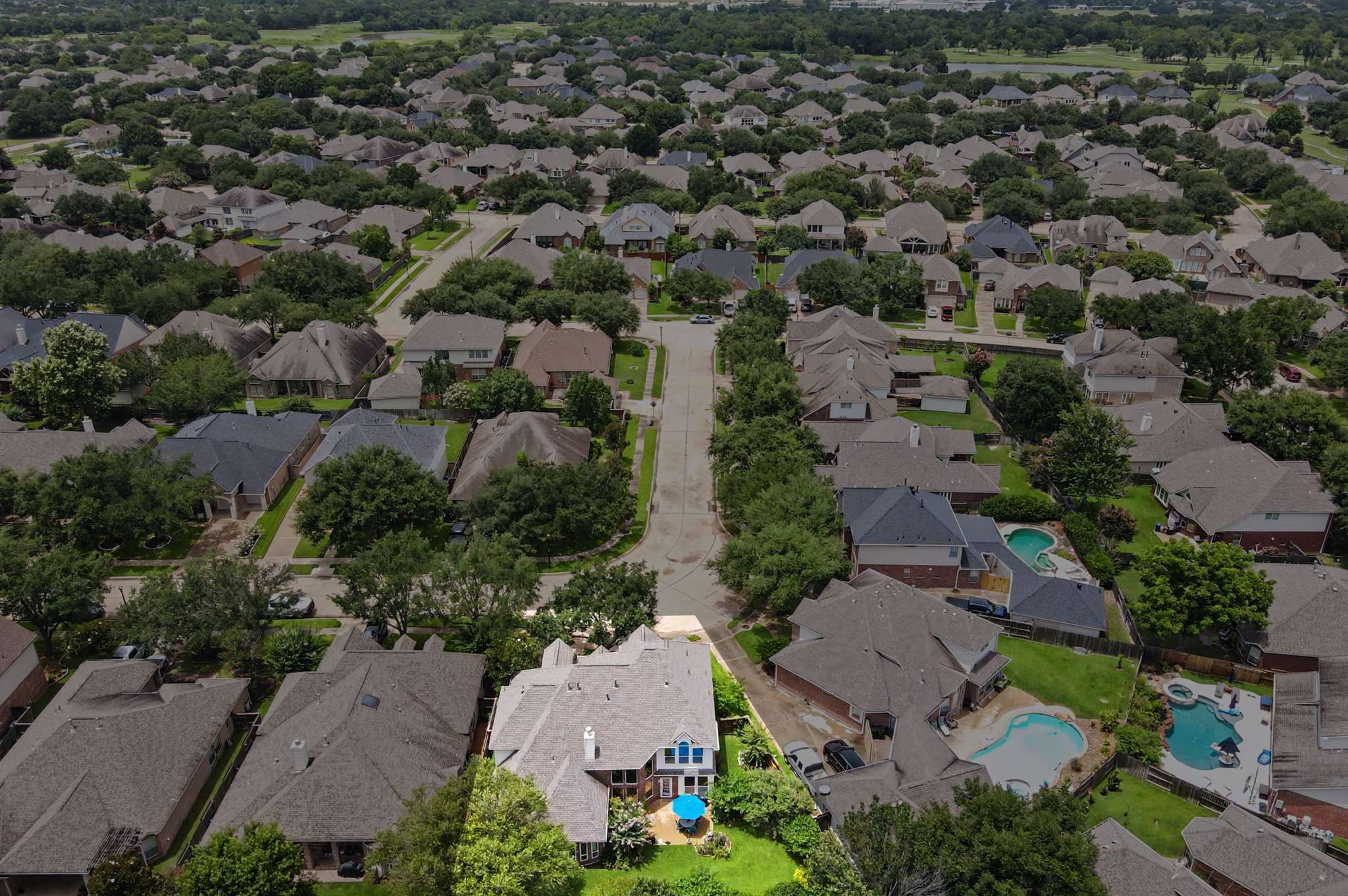 65 of 71. Spacious backyard with pool and a prime corner lot in a family-friendly neighborhood.