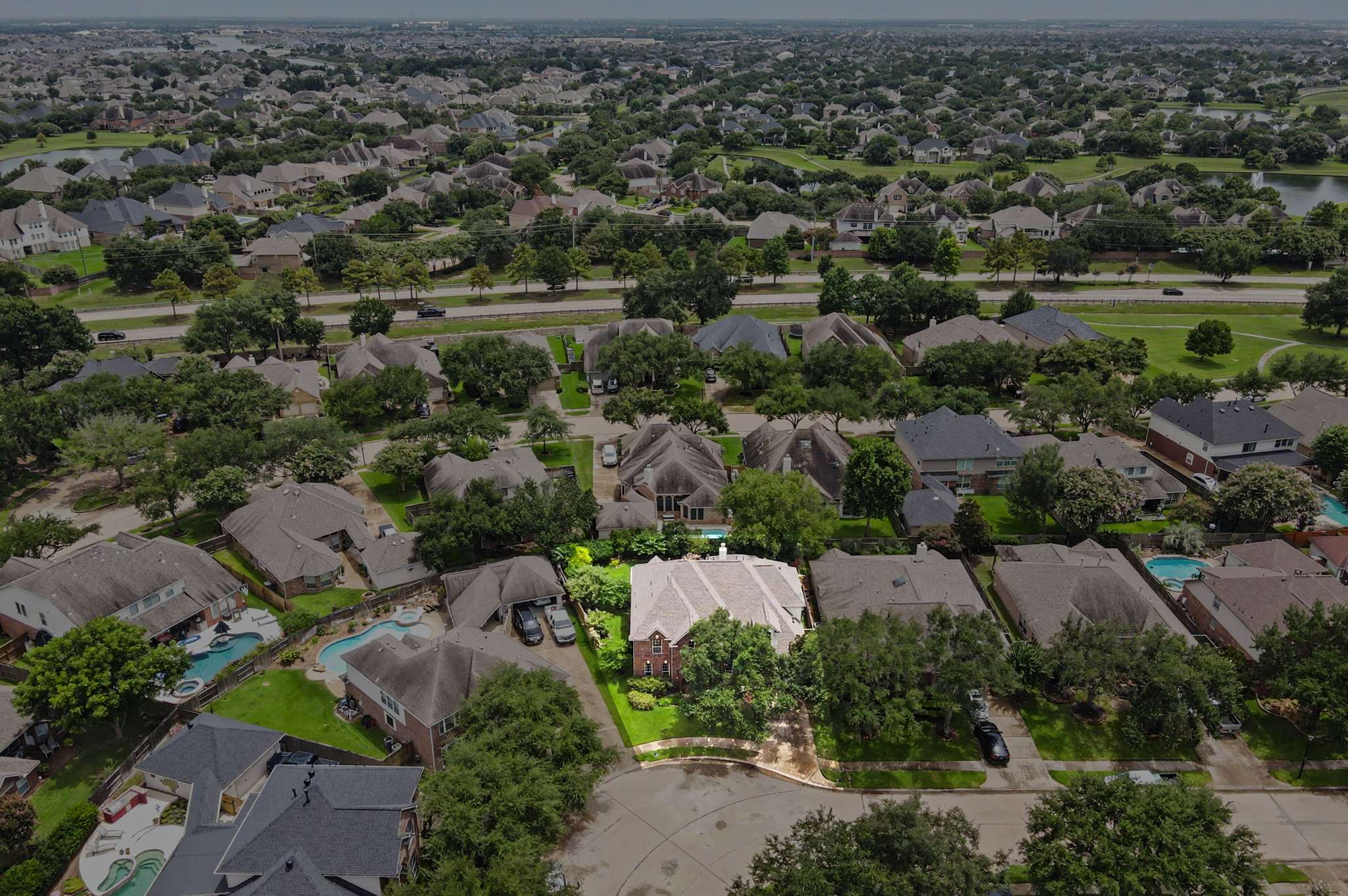 66 of 71. Spacious home nestled in a vibrant community, surrounded by lush greenery and convenient amenities.