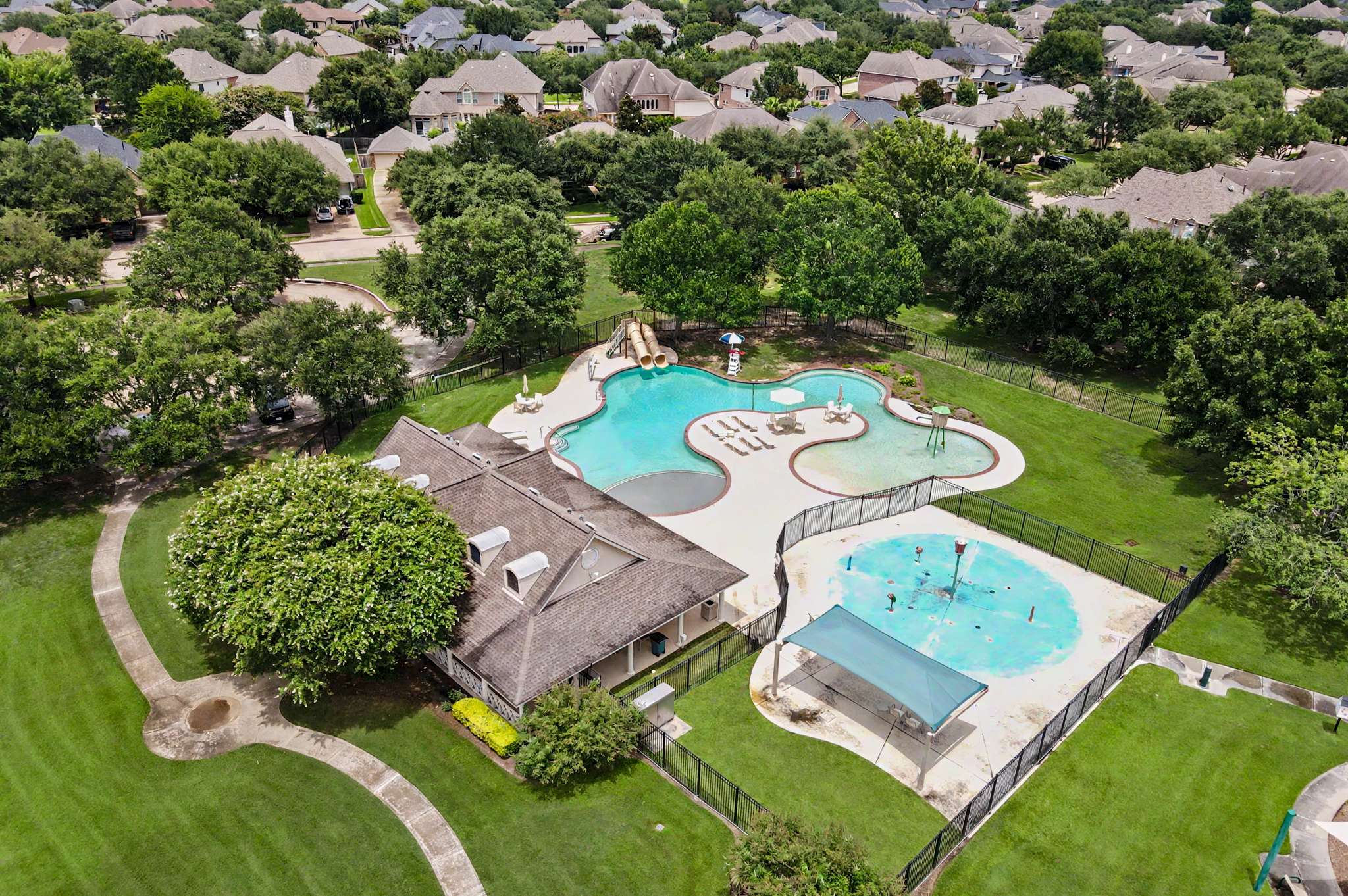 71 of 71. Discover a spacious community with a pool, kids' play area, and lush greenery perfect for outdoor activities.