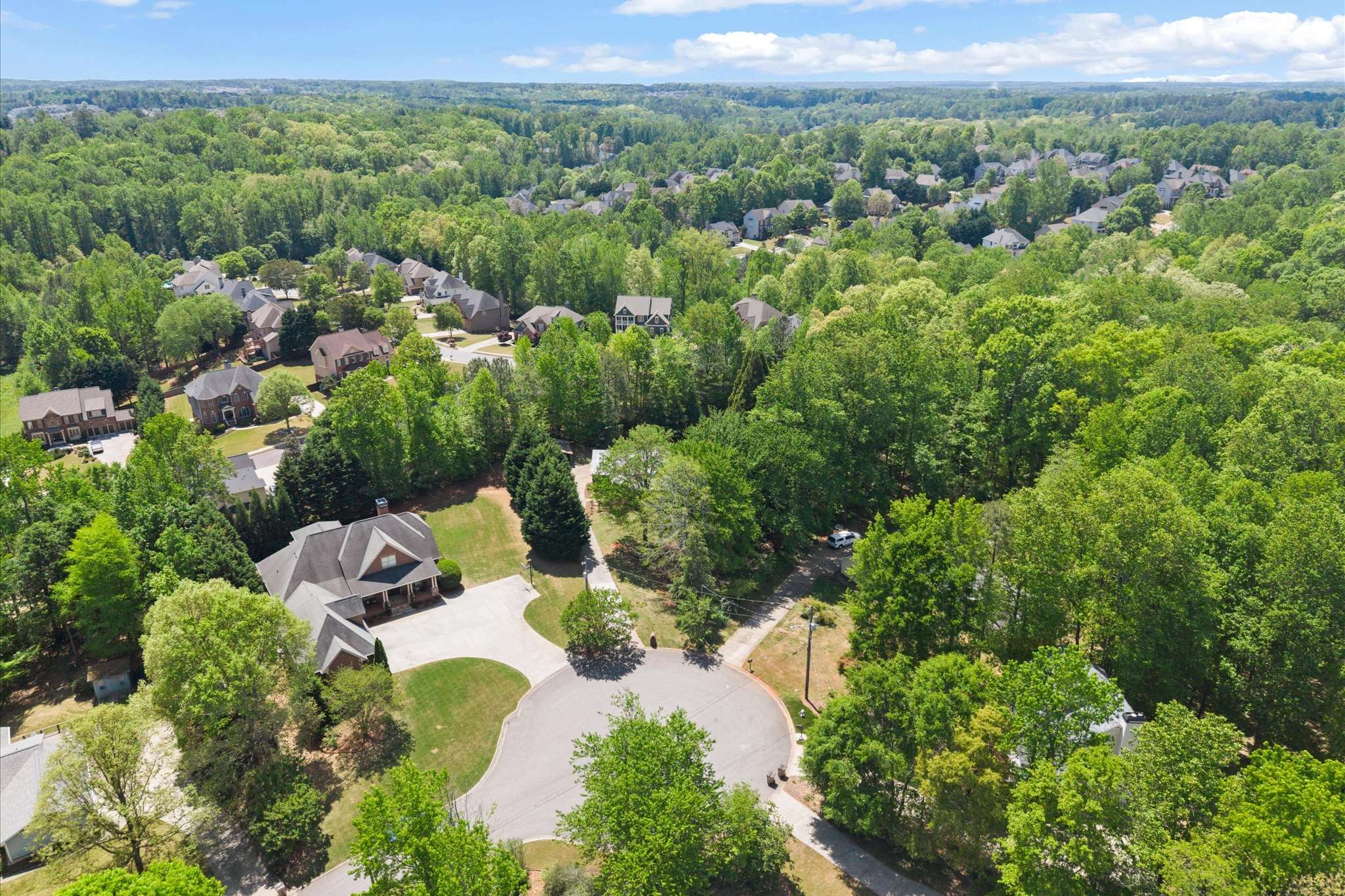 58 of 72. Discover a spacious home nestled in a lush, green community with stunning views and ample privacy.