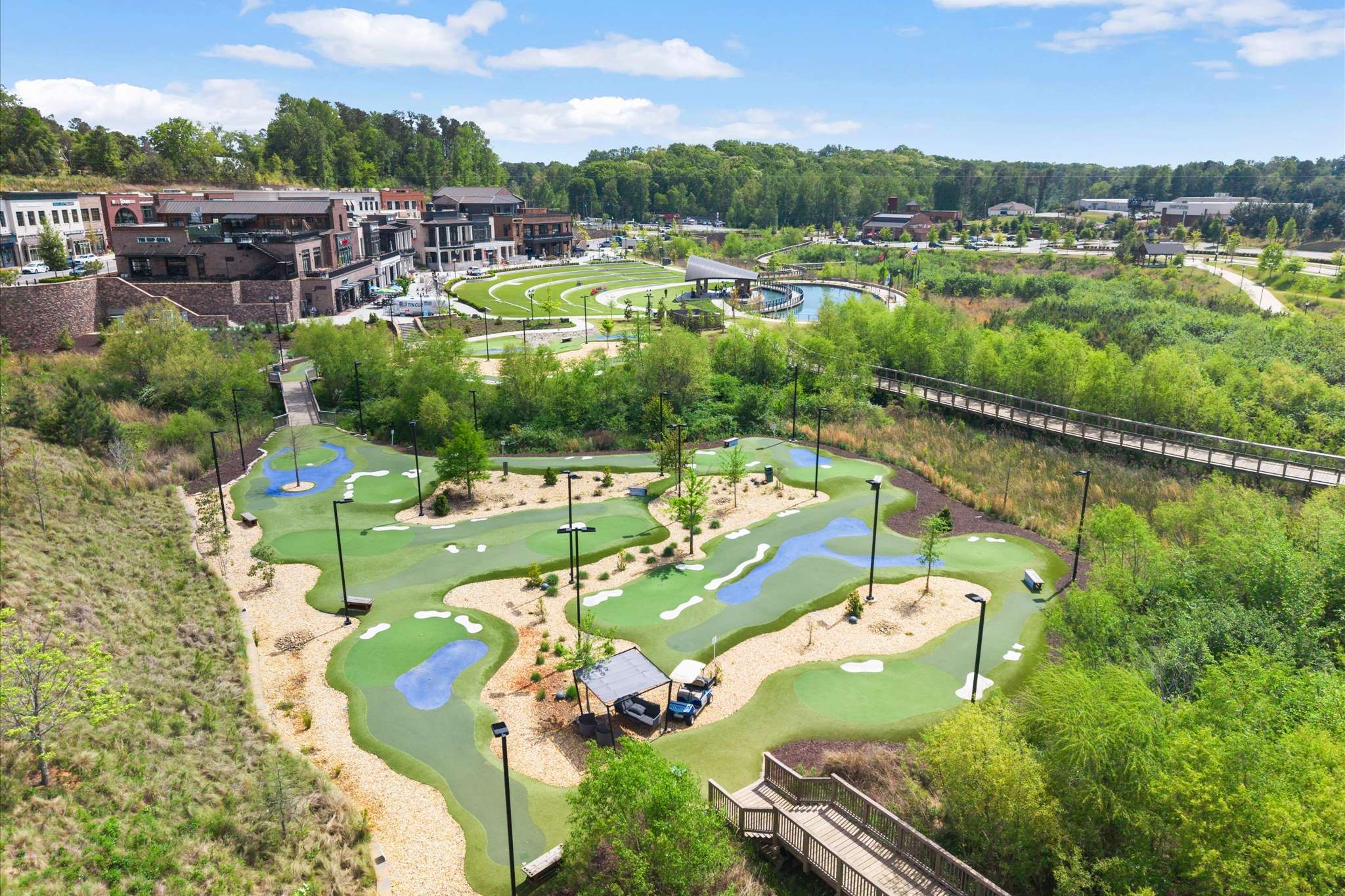 65 of 72. Discover this unique property featuring expansive greens and recreational areas, perfect for outdoor enthusiasts and families.