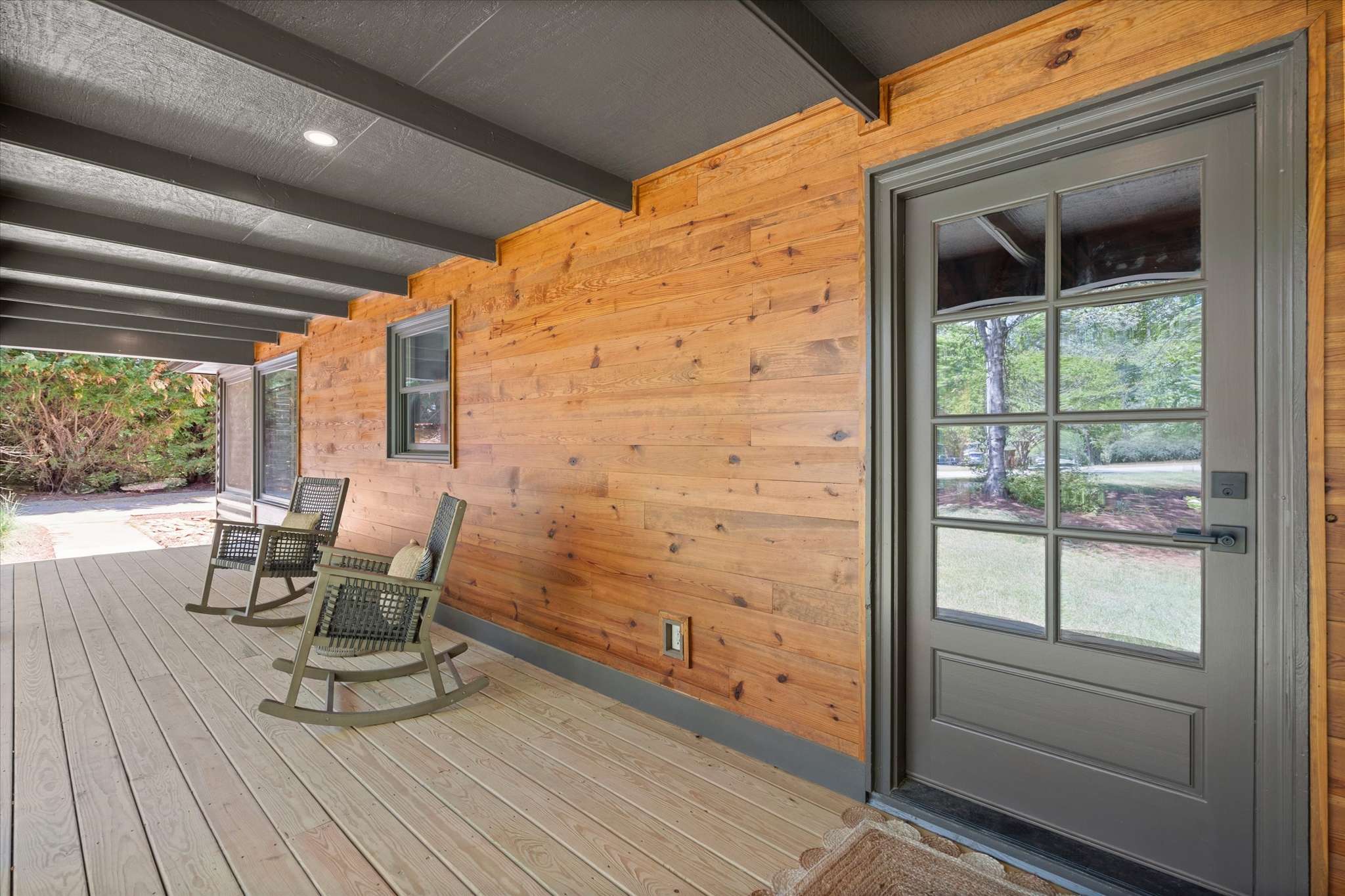 12 of 72. Discover this inviting porch with a natural wood finish, perfect for relaxing and enjoying outdoor moments.