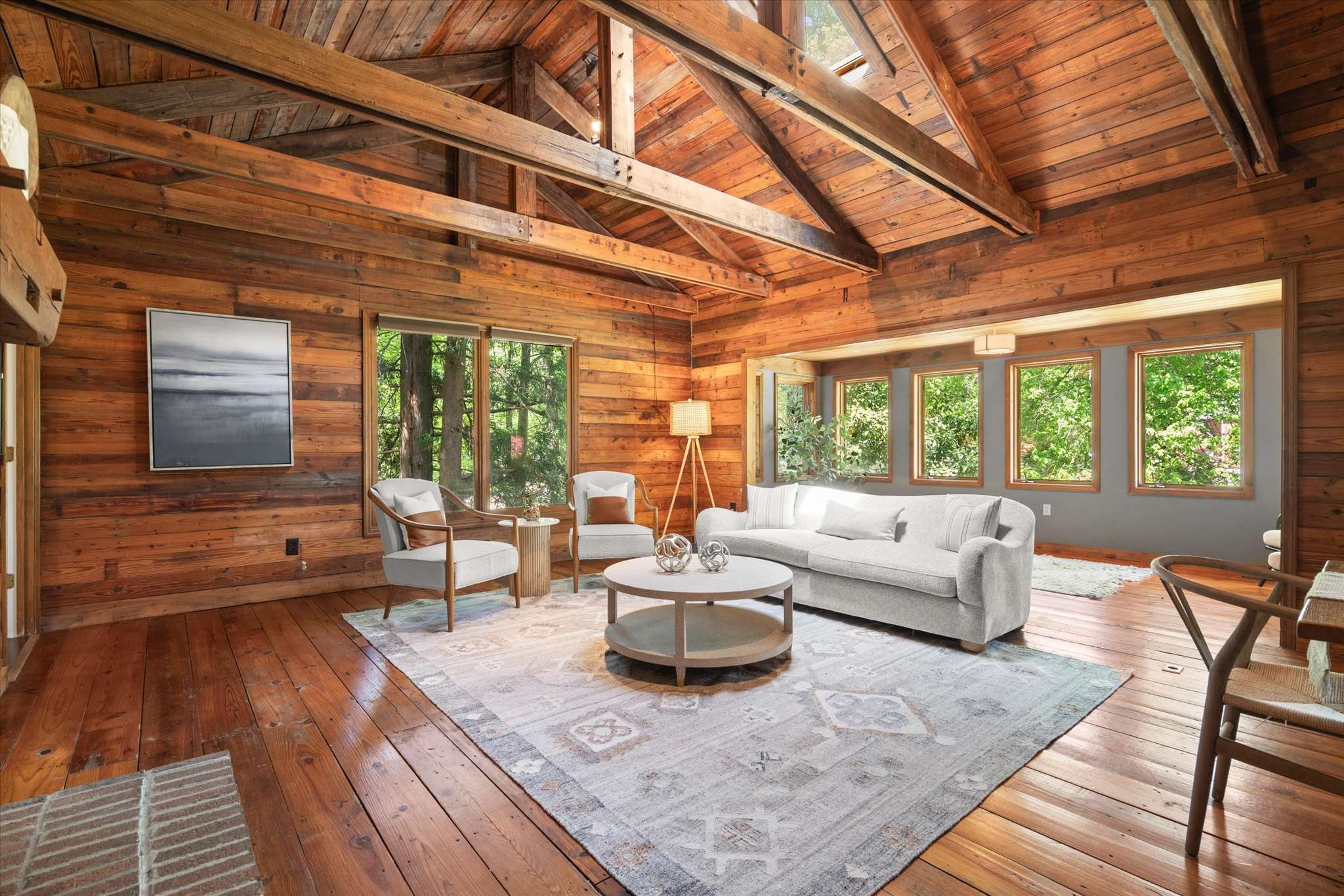 16 of 72. Warm wood finishes and abundant natural light create an inviting space, perfect for relaxation and gathering.