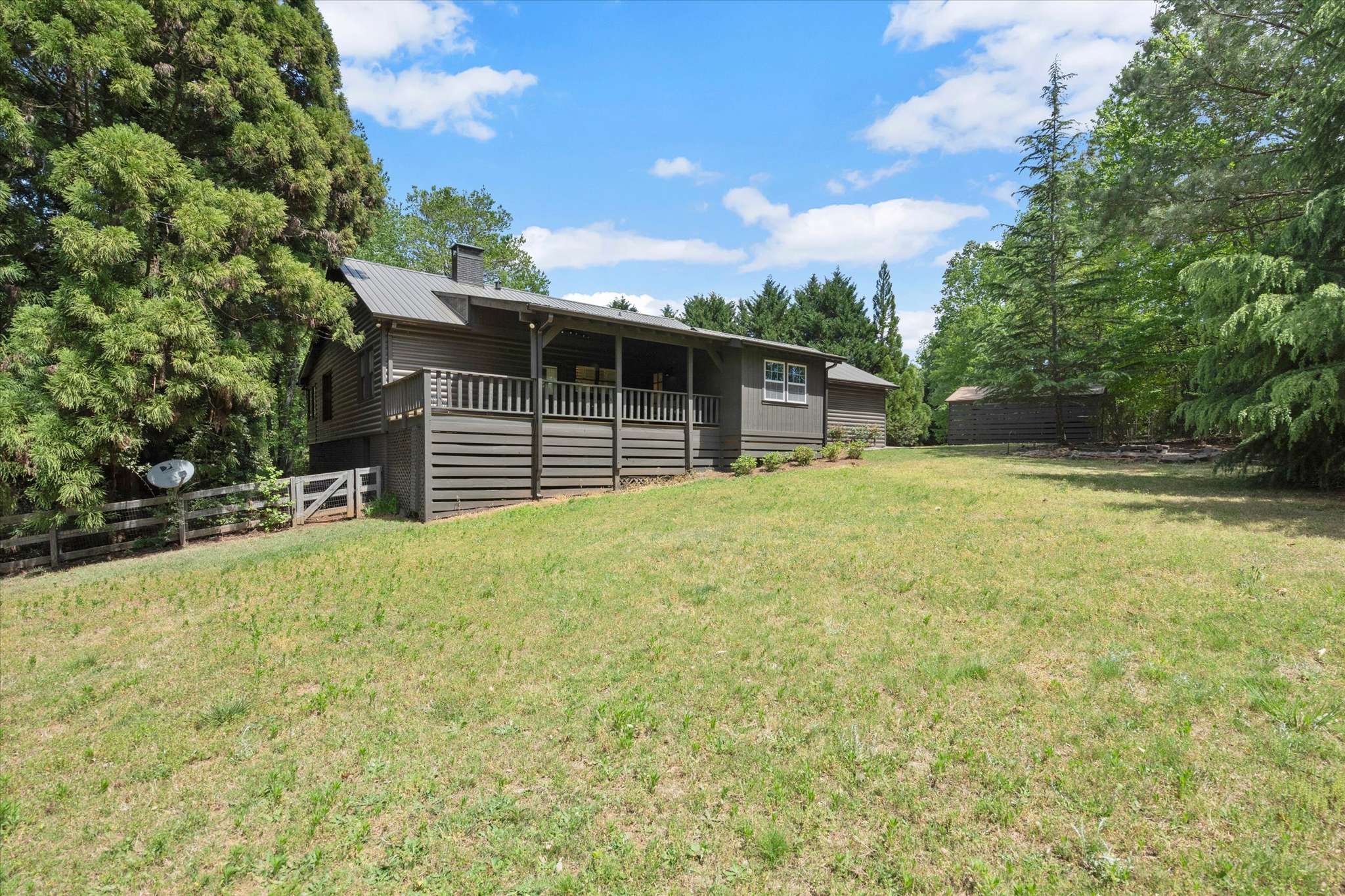 53 of 72. This inviting home features a spacious yard, perfect for outdoor activities and gatherings.