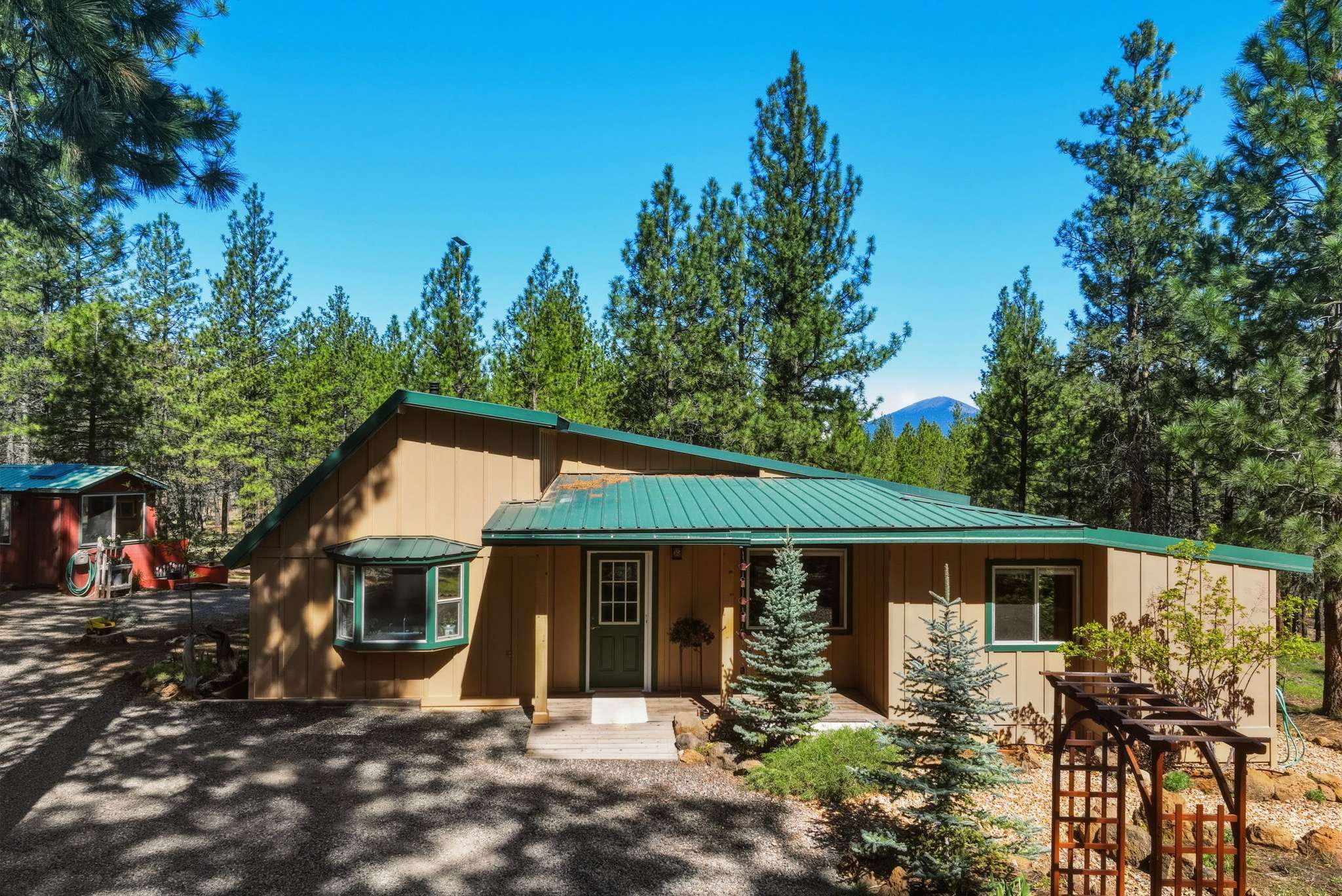 2 of 61. This secluded home offers a blend of modern conveniences and natural surroundings, perfect for outdoor enthusiasts.