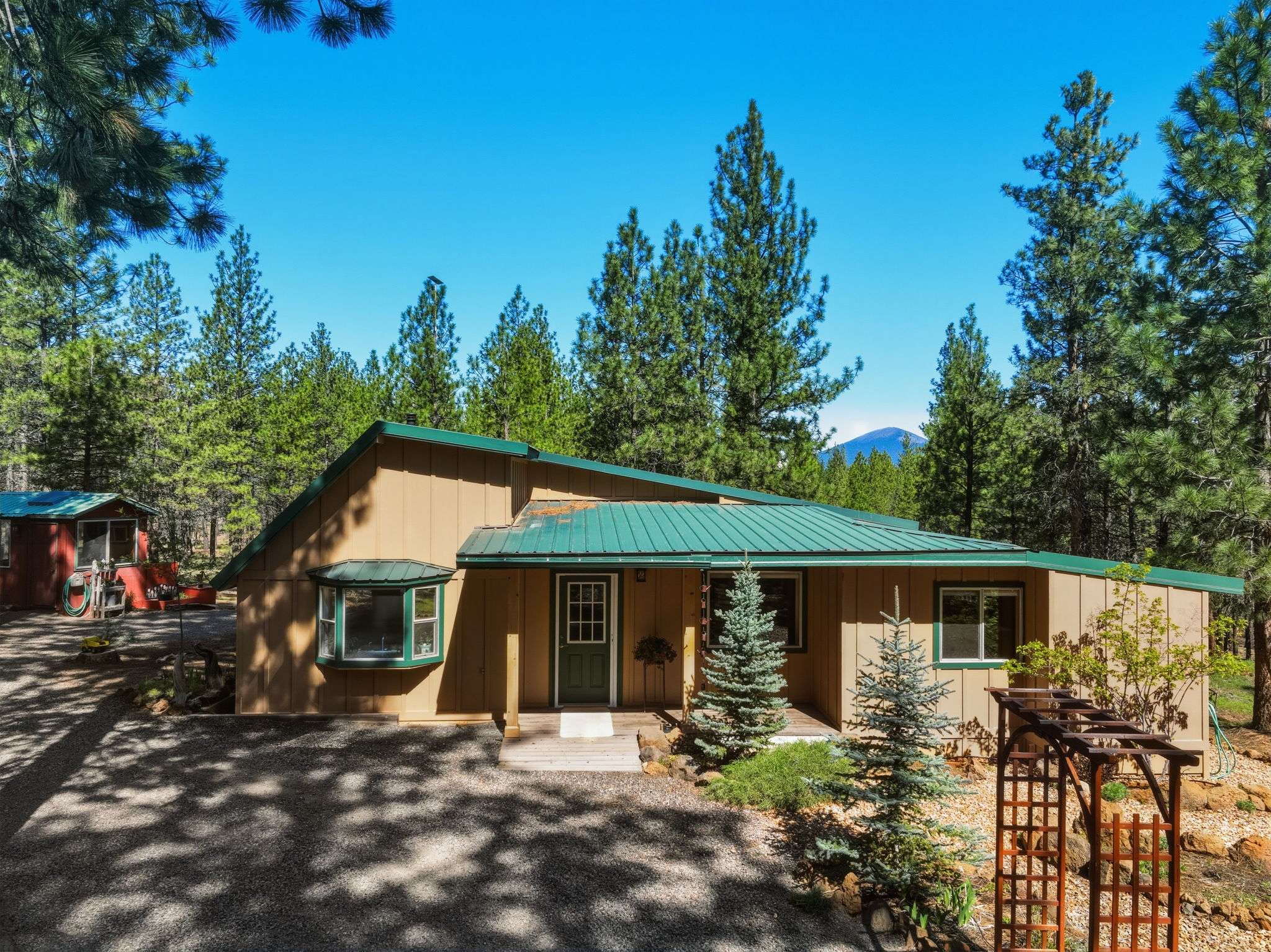 1 of 61. This secluded home offers a blend of modern conveniences and natural surroundings, perfect for outdoor enthusiasts.