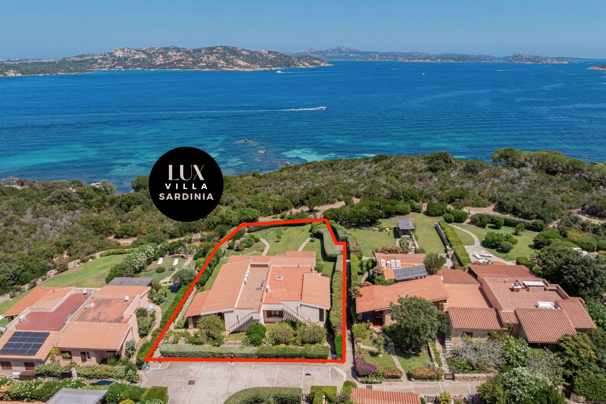 4 of 66. Stunning waterfront property with expansive views and lush landscaping, perfect for relaxed coastal living.