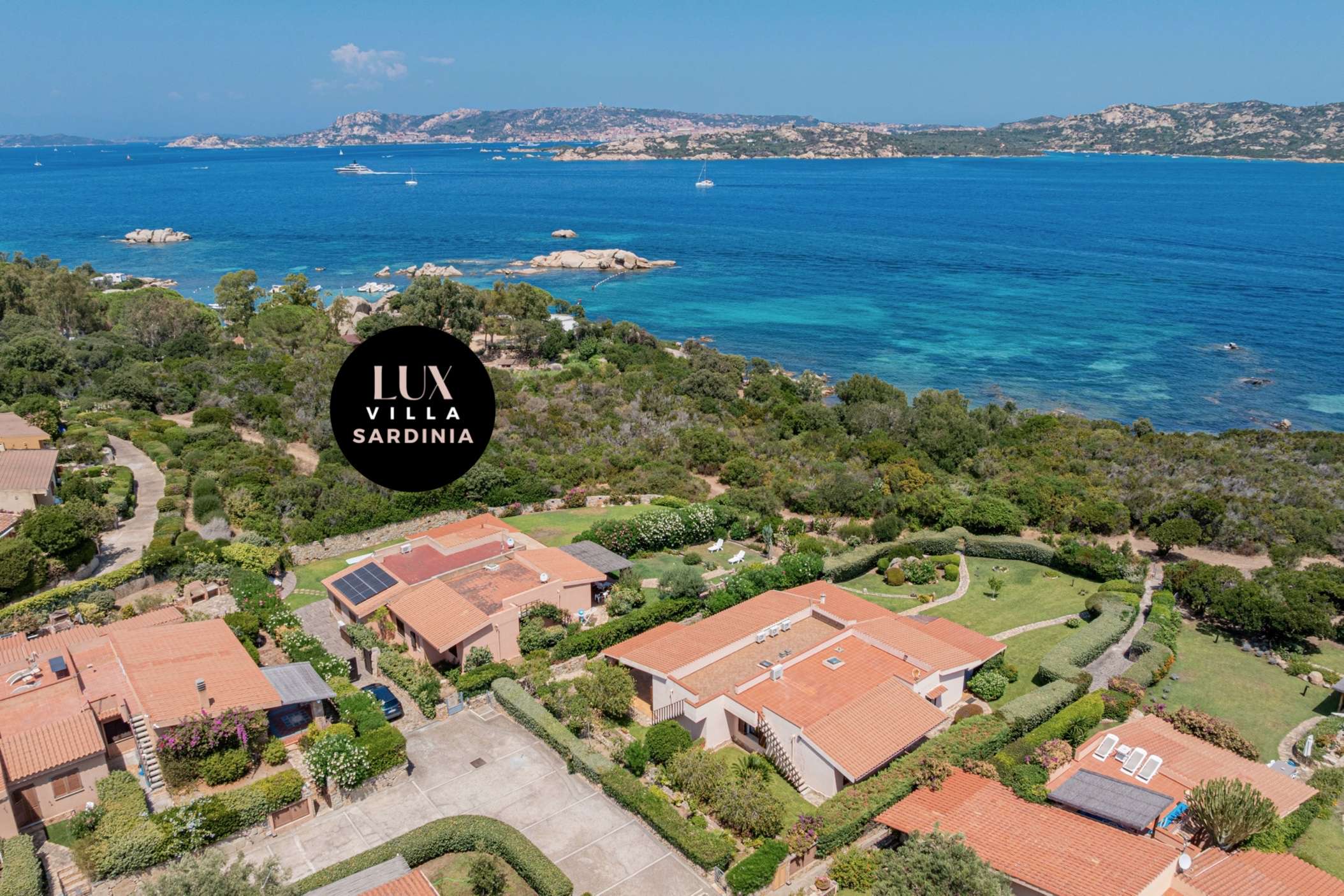 1 of 66. This coastal villa offers stunning views and direct access to beaches, perfect for seaside living.