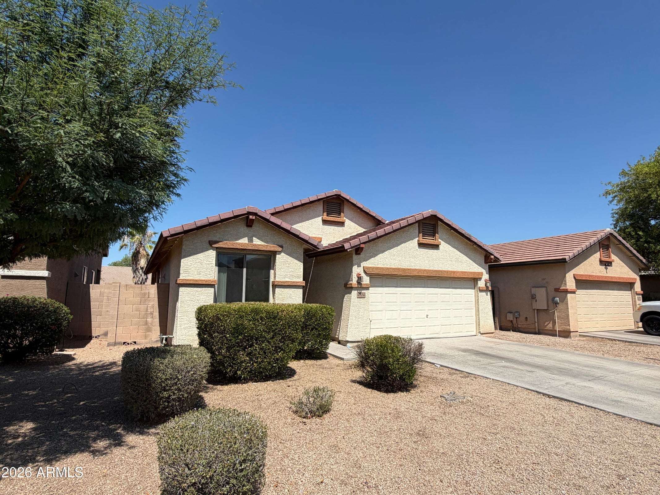 3 of 31. Attractive exterior featuring mature shrubs, clean architectural lines, and easy-care desert landscaping. This rental home offers lasting curb appeal in a convenient Phoenix location.