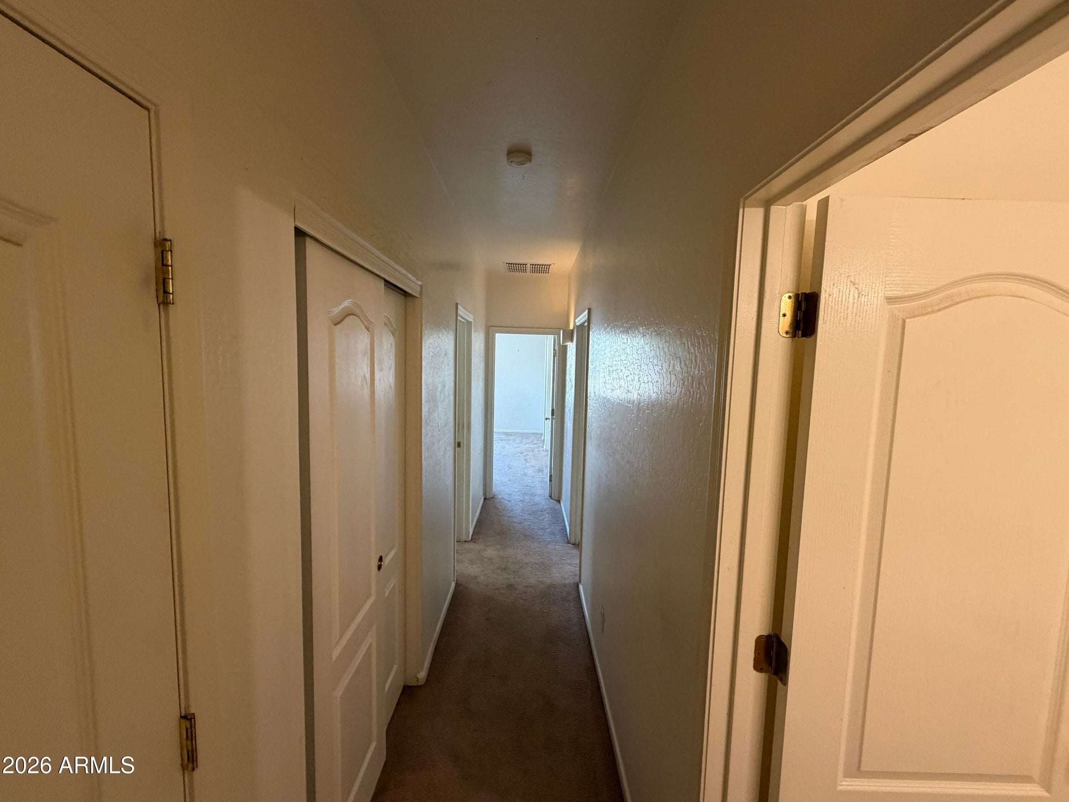 15 of 31. Interior hallway connects the bedrooms and bathrooms while creating a quiet separation from the home's main gathering areas. A thoughtful floor plan for added privacy.