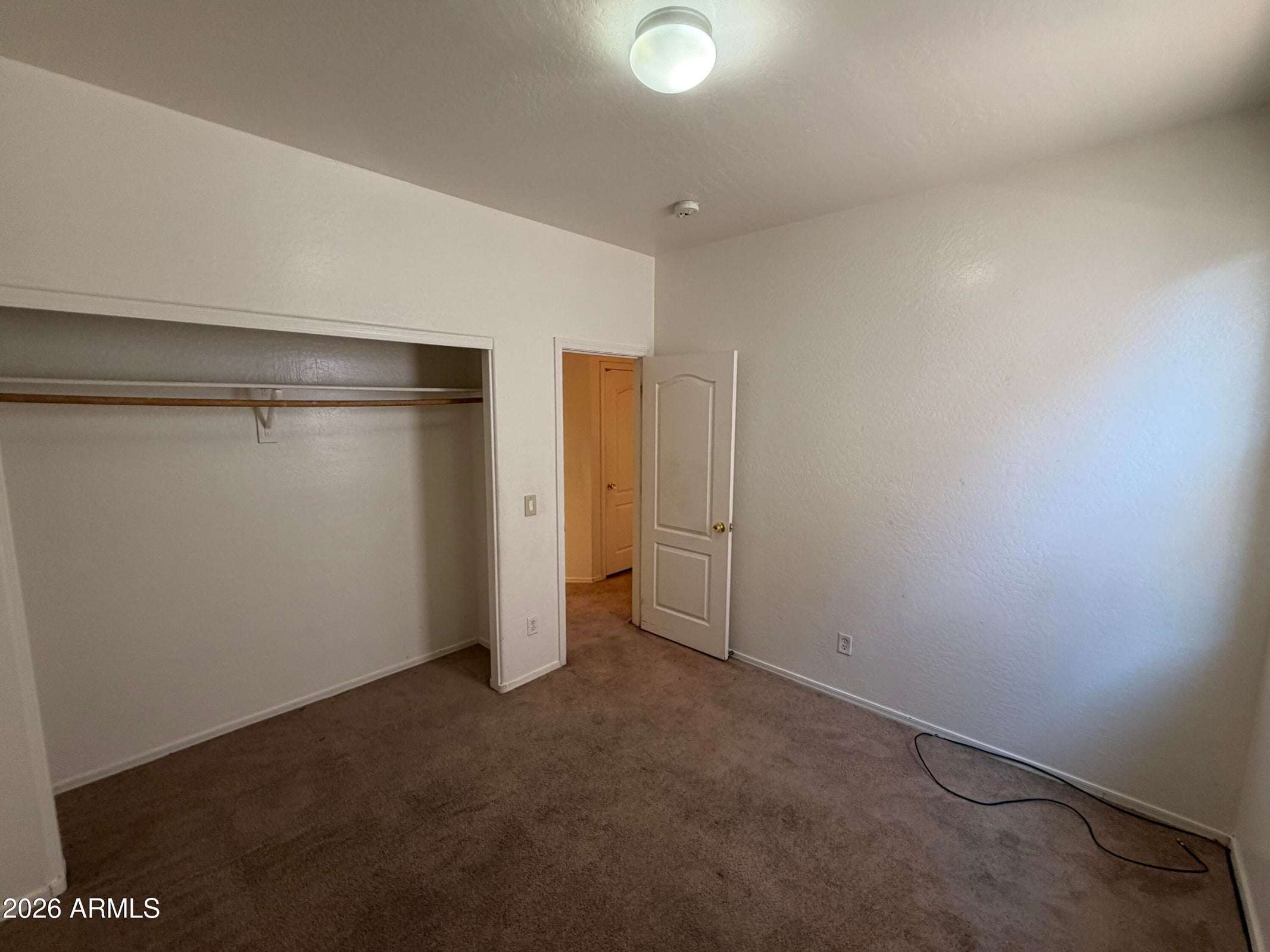 23 of 31. Comfortable bedroom featuring soft carpeting, generous closet storage, and a versatile layout ready to fit your lifestyle needs.