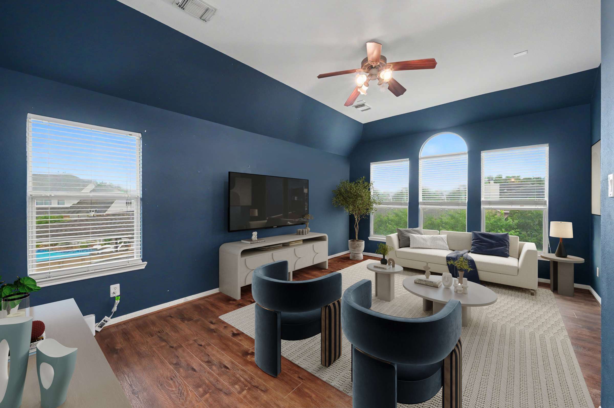 51 of 71. Modern living space with high ceilings, large windows, and an inviting layout perfect for relaxation and entertainment.