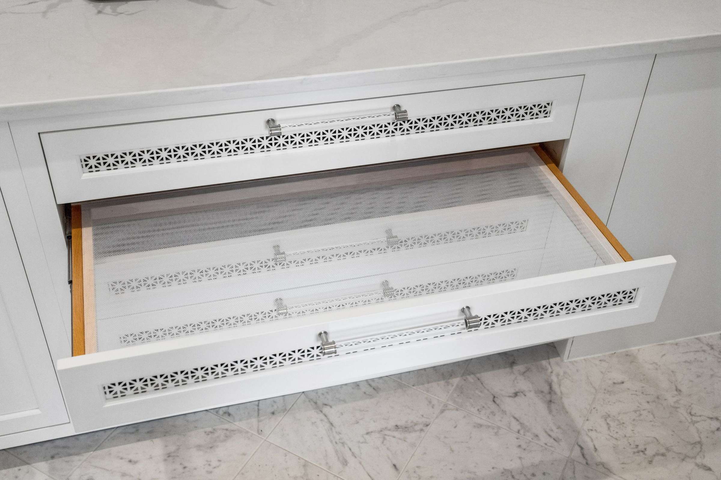 76 of 155. Mesh drying drawers.