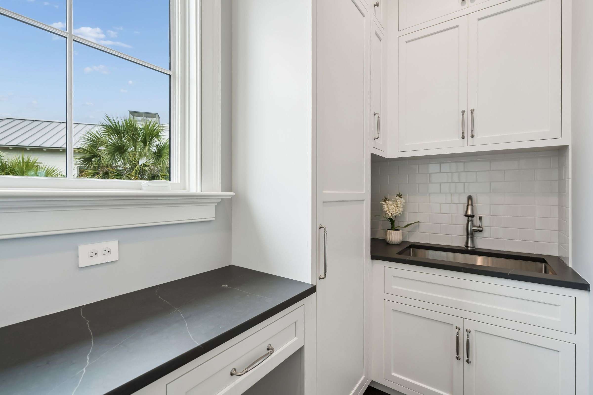 61 of 155. Mudroom on first floor, located just around the corner from the powder room.