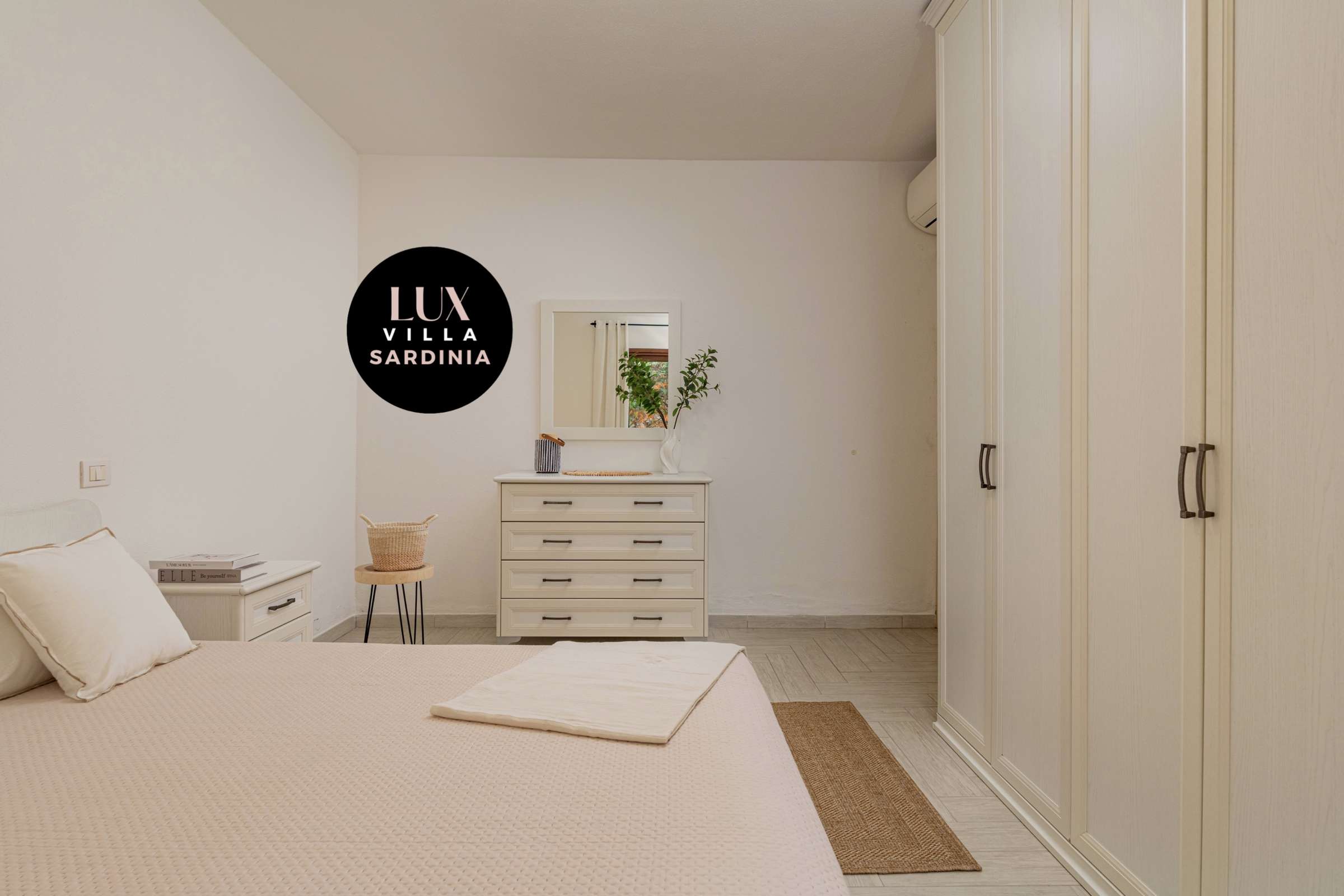 26 of 66. Bright bedroom featuring modern furnishings, ample storage, and a cozy atmosphere for relaxation.