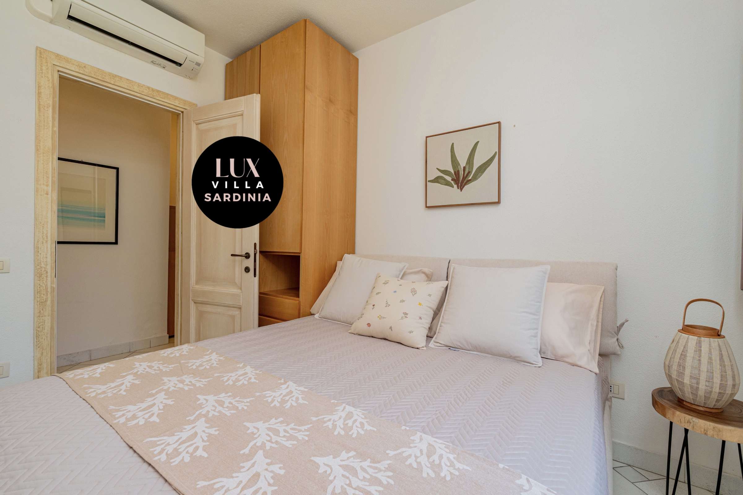 41 of 66. This cozy bedroom features a light color scheme and convenient storage, perfect for comfort and relaxation.