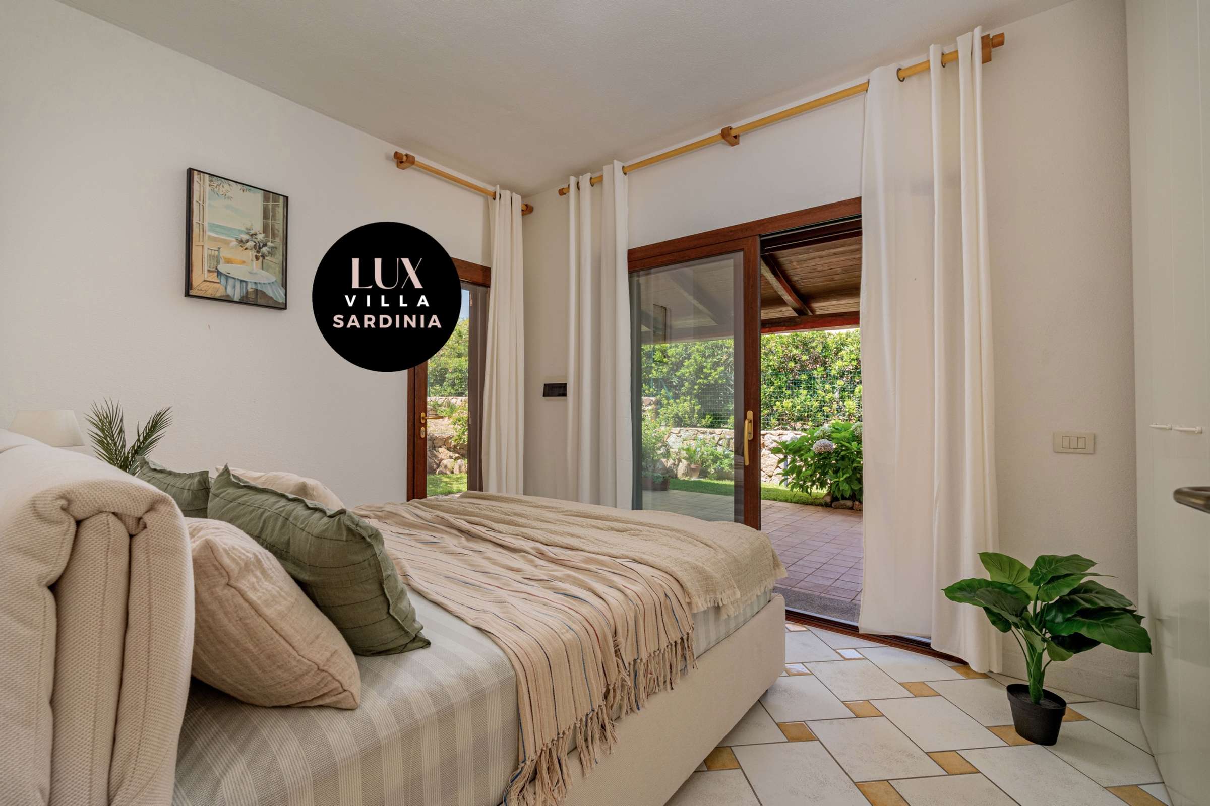 42 of 66. Bright bedroom with outdoor access, featuring plush bedding and inviting greenery for a refreshing ambiance.