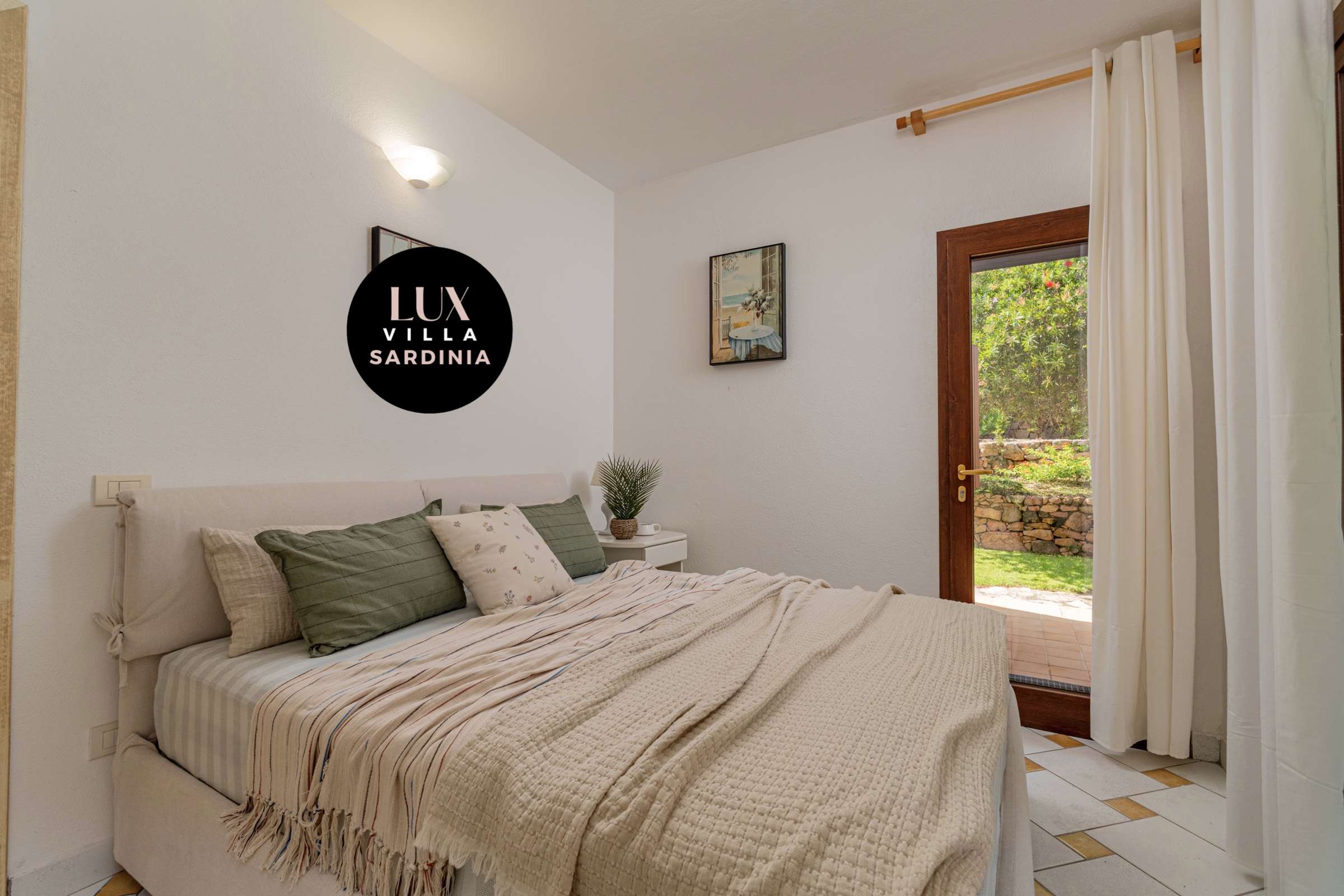 43 of 66. Cozy bedroom with natural light, featuring direct access to a private outdoor space.